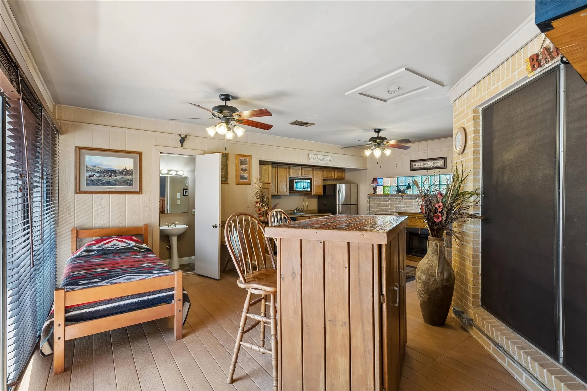 The crown jewel of this home is a spacious game room with a full bath and kitchenette that opens to a large private open outdoor deck, perfect for entertaining!