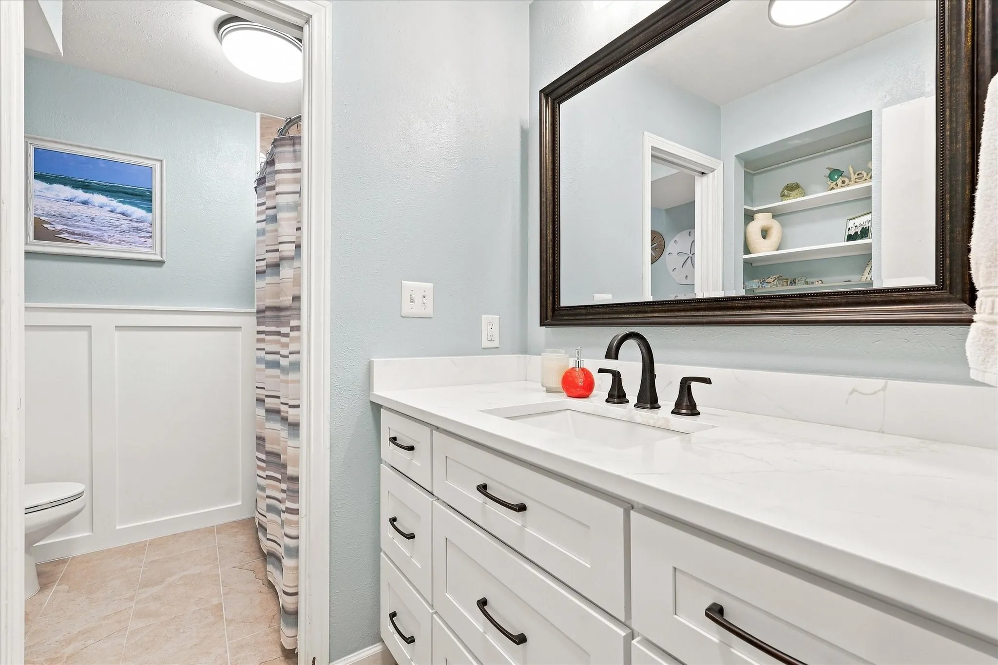 Hall Bathroom with separate bathing area.