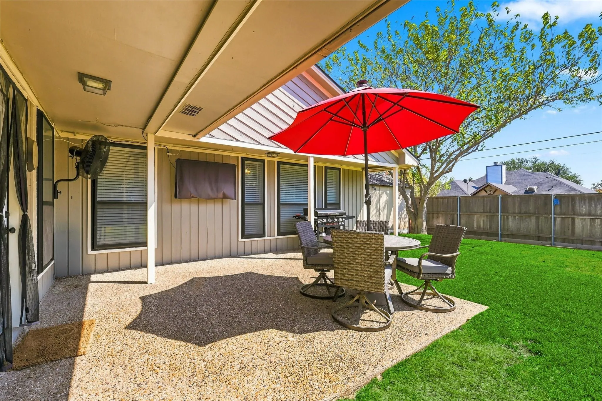 Extended patio is perfect for outdoor dining.