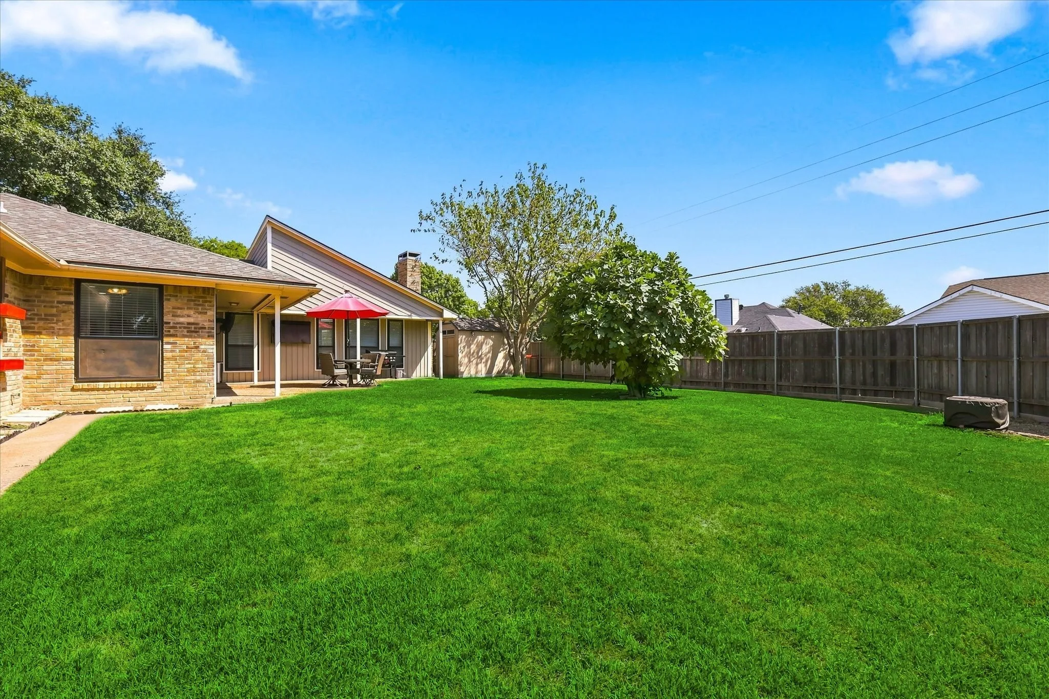 Large corner lot with lots of room to roam & play.