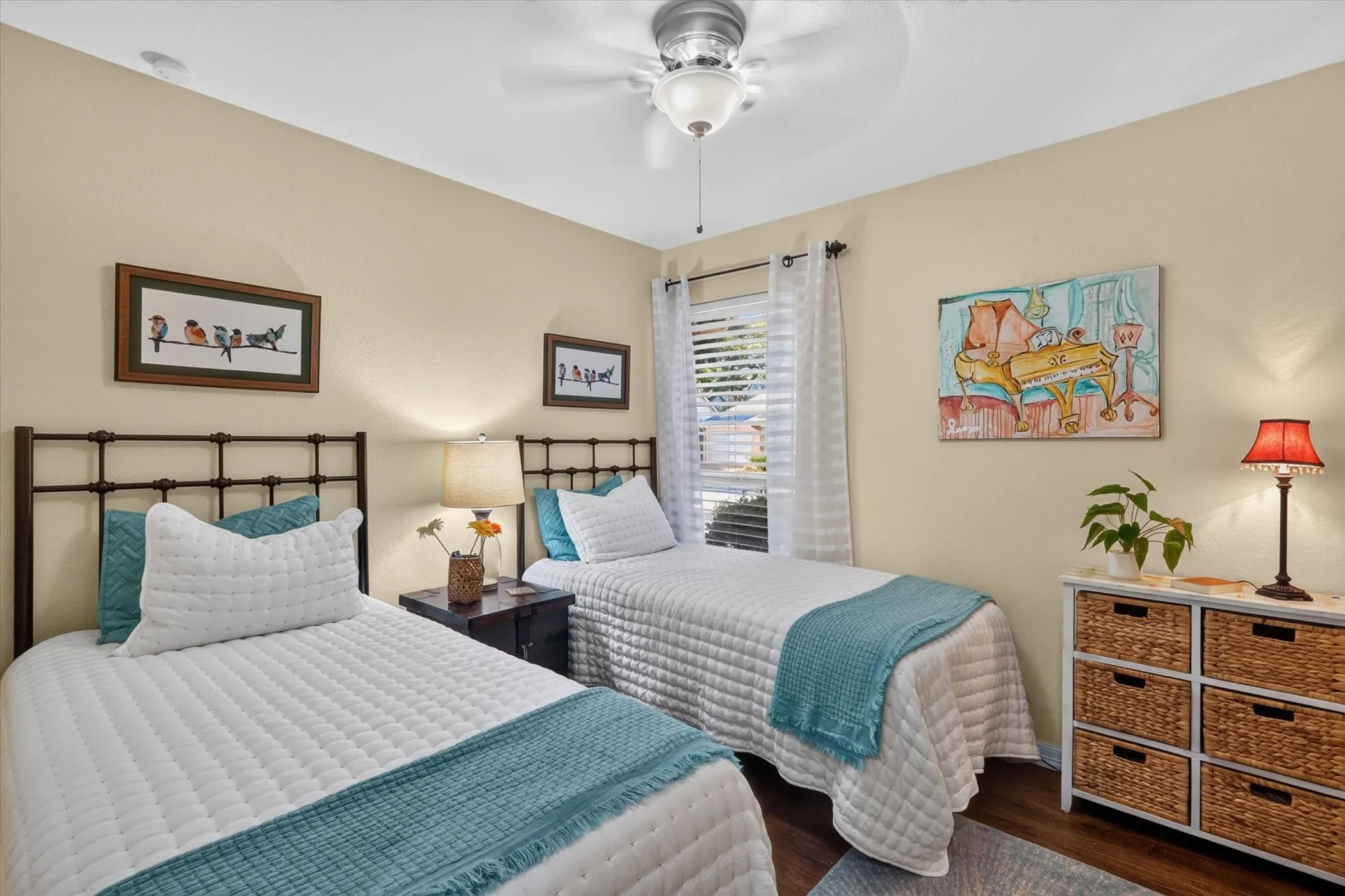 Recessed lighting, wood-finish flooring, ceiling fan with integrated lighting, and a window with blinds
