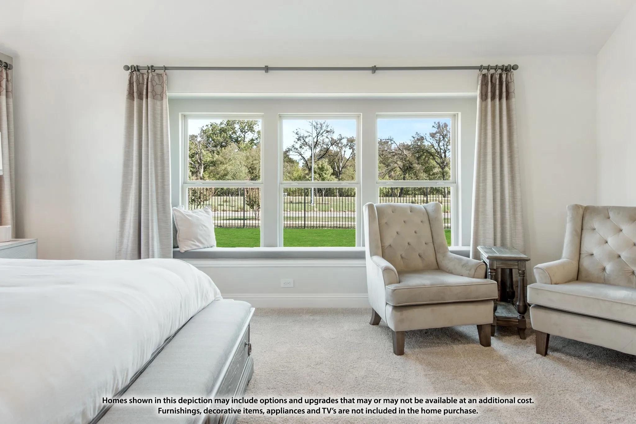 Triple window unit with a built-in window seat and neutral carpeting