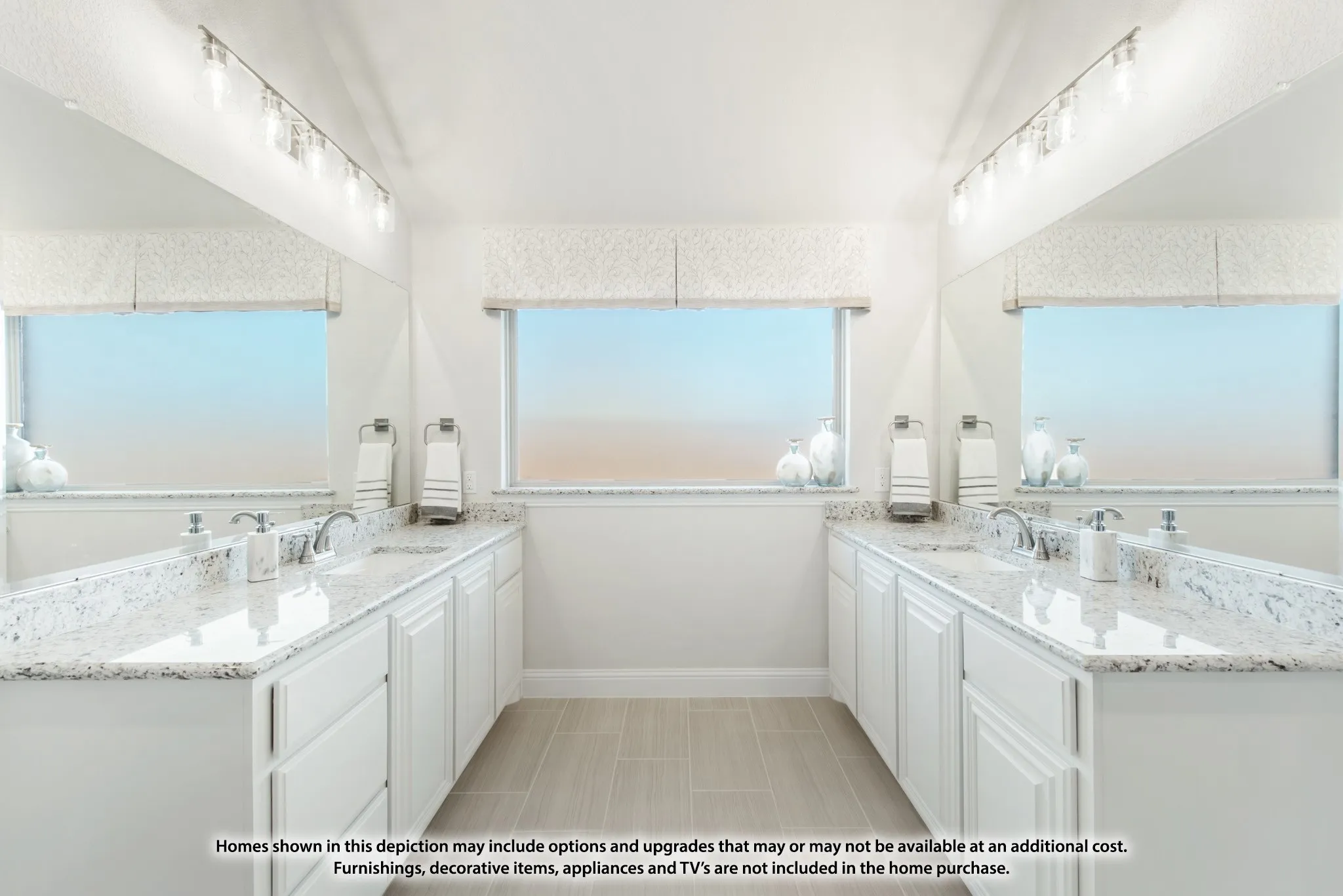 Dual vanity with white cabinetry, light-toned countertops, and two integrated sinks