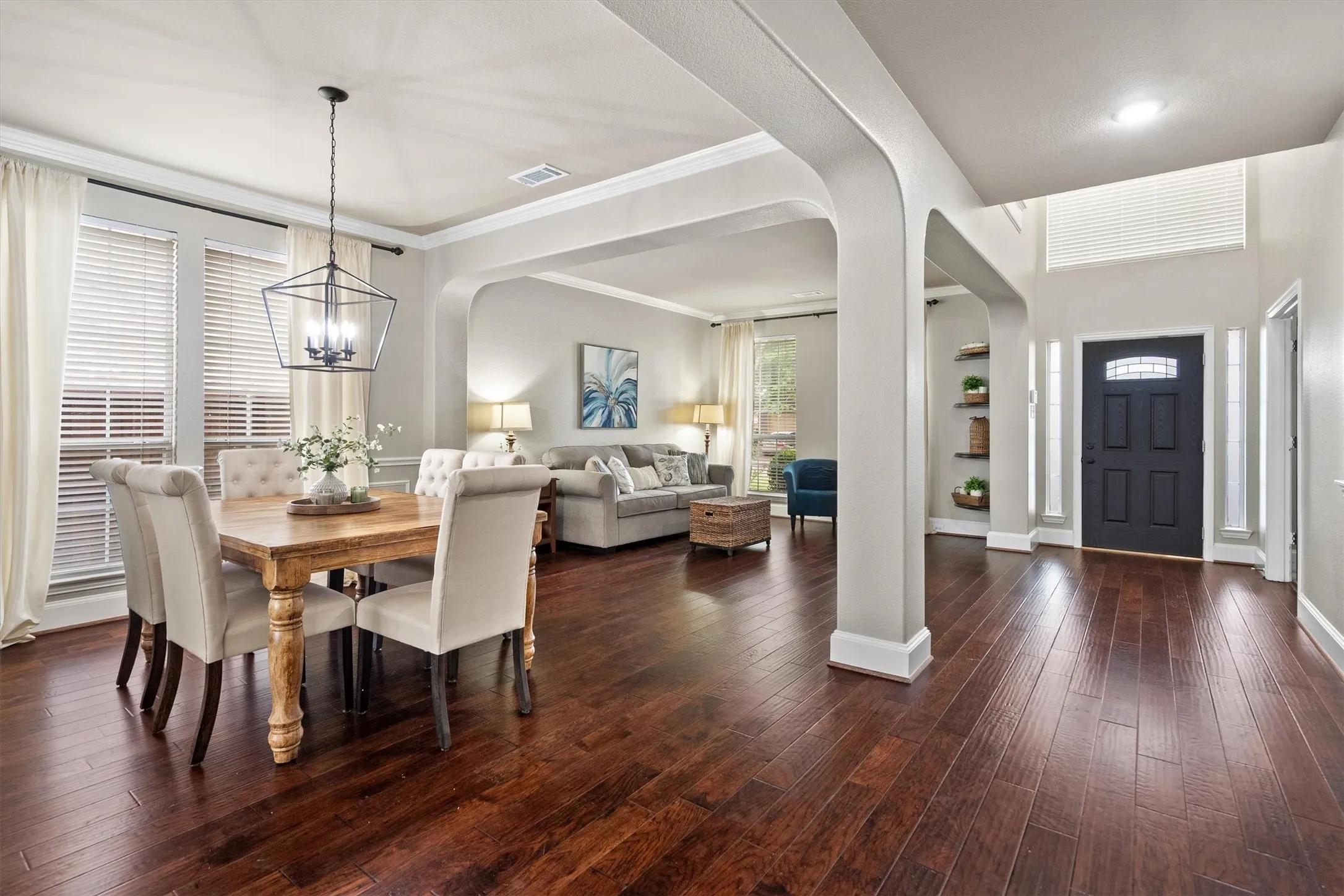 The more formal front of the home is open and bright with a 2-story entryway and an abundance of natural light.