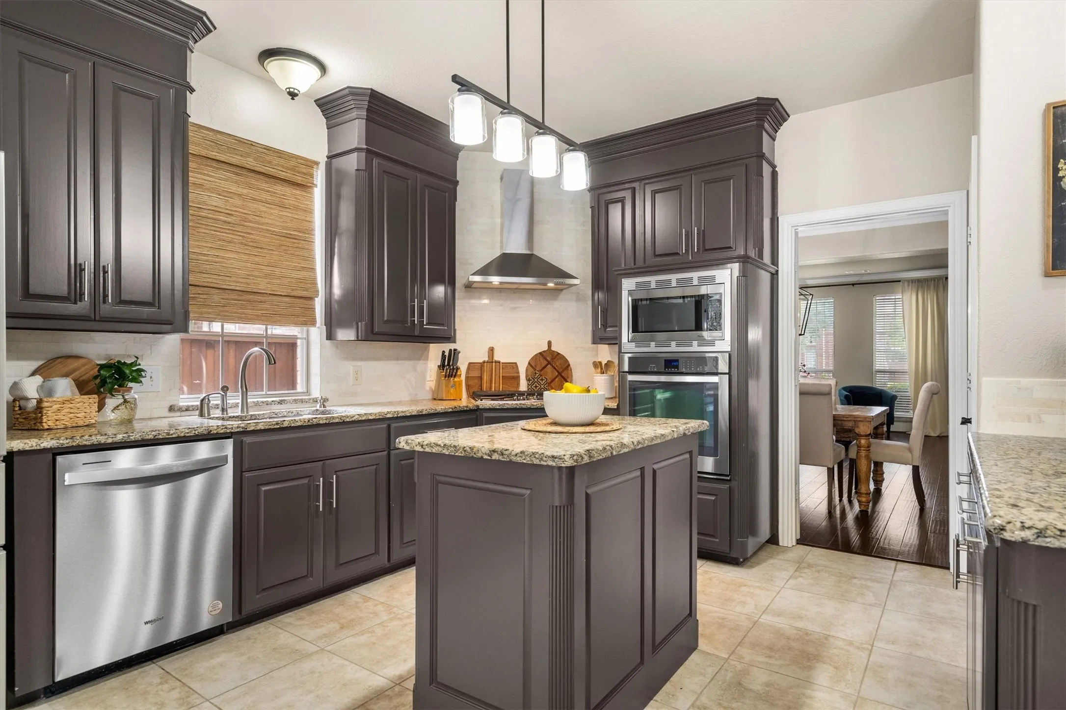 Remodeled kitchen with soft close drawers, cabinets to the ceiling, and pull out shelves