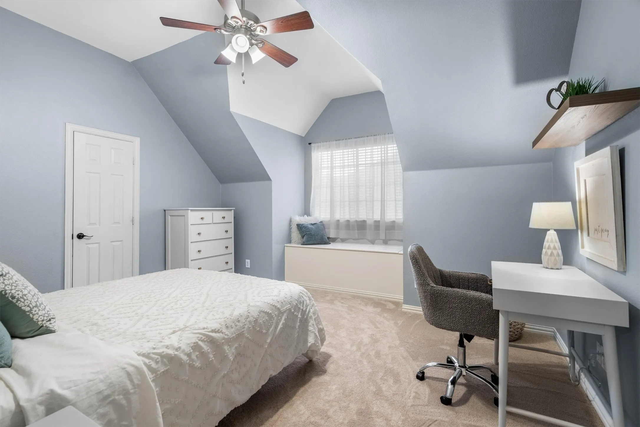 Bedroom #4 features a cozy window seat.