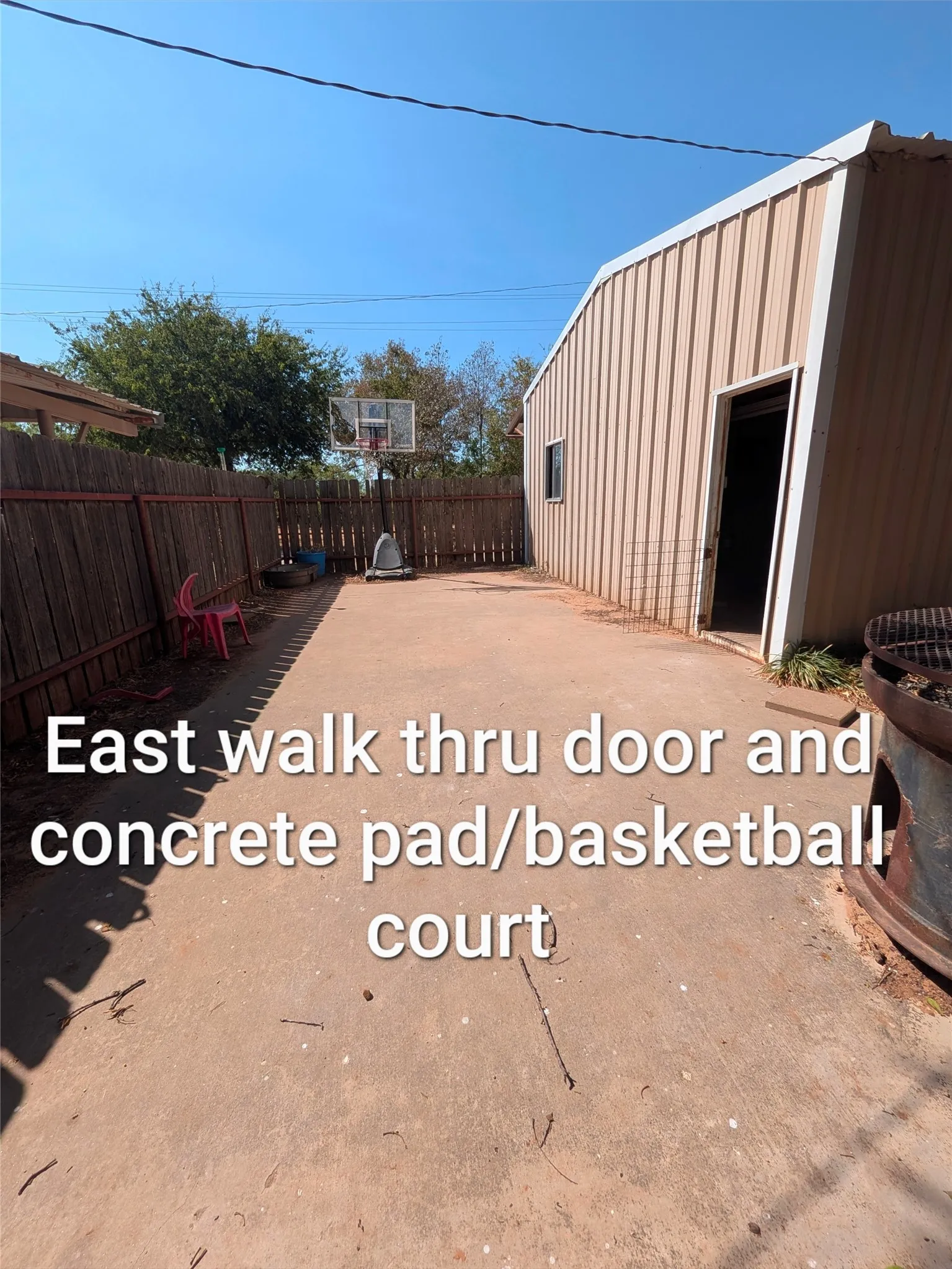 basketball court in front of workshop