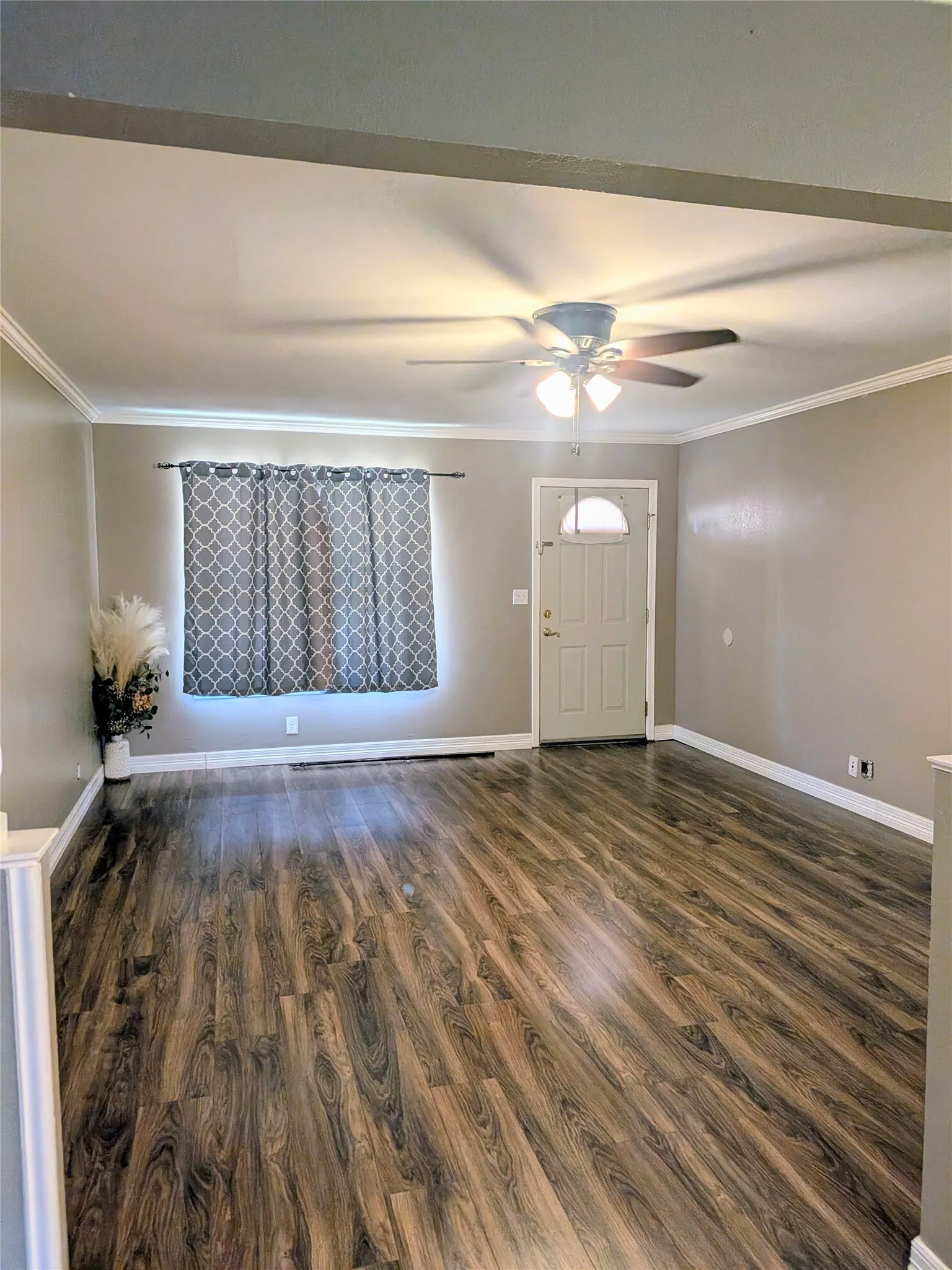 Living room and entry way taken from dining area