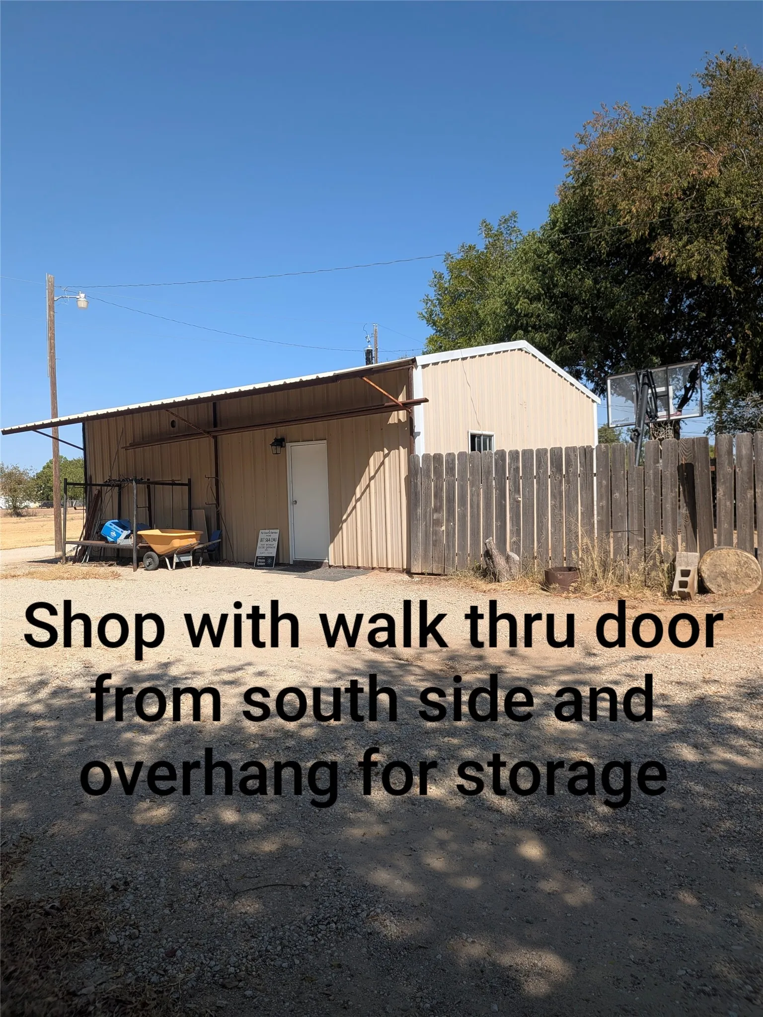 Exterior of workshop showing overhang for storage