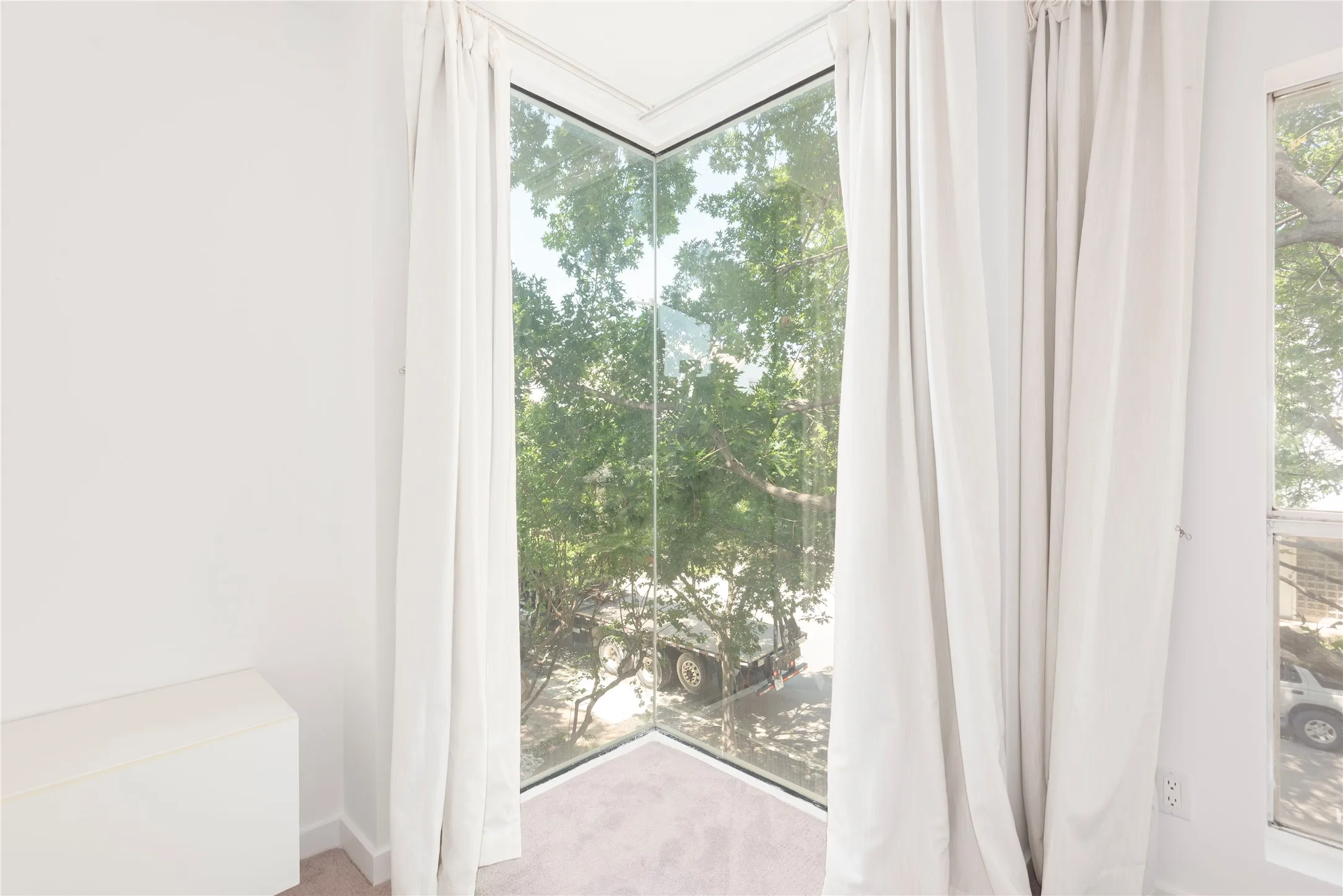 LOVE this corner window with view of the treetops