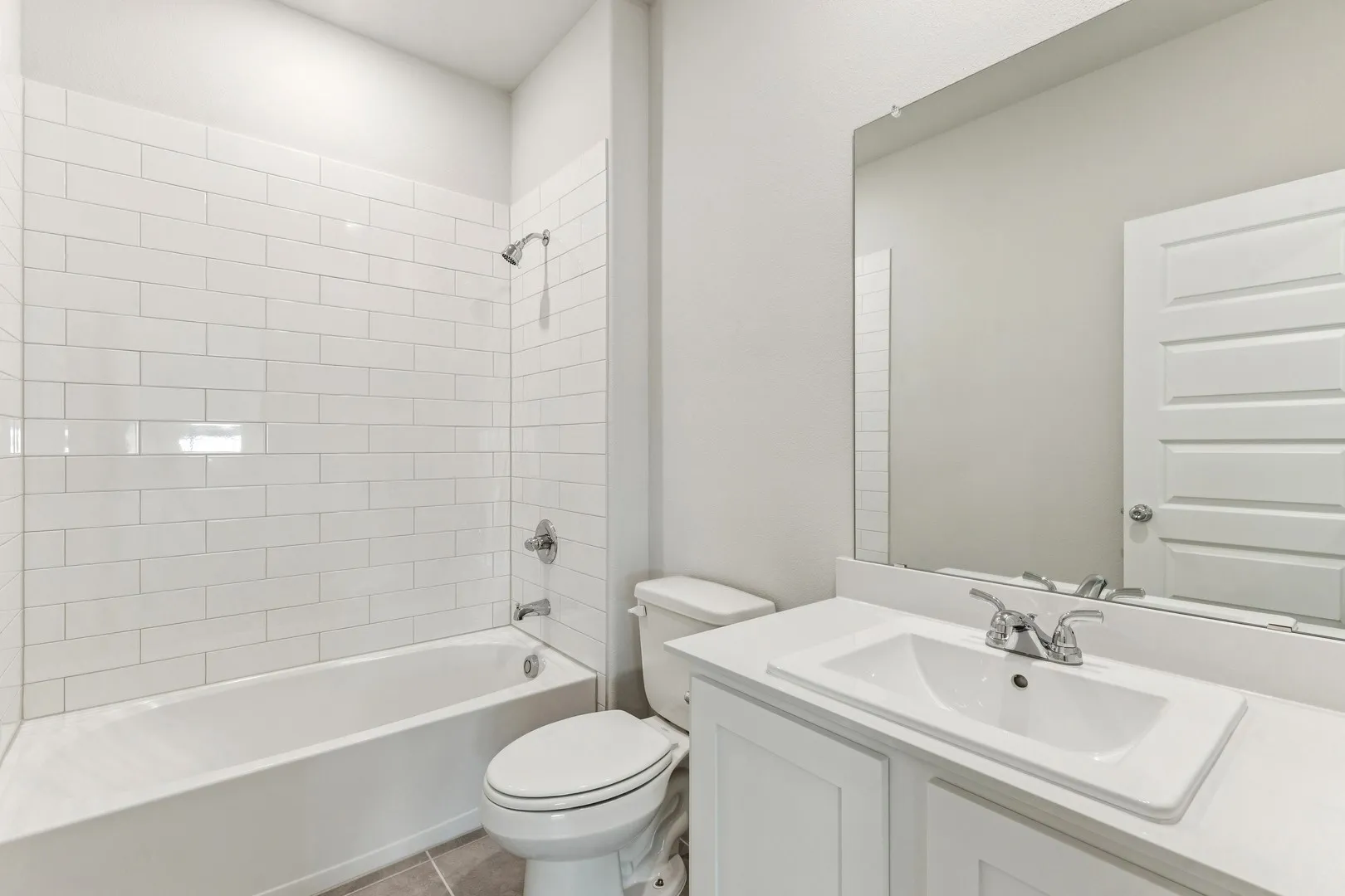 Bathroom in the Wimbledon home plan by Trophy Signature Homes – REPRESENTATIVE PHOTO