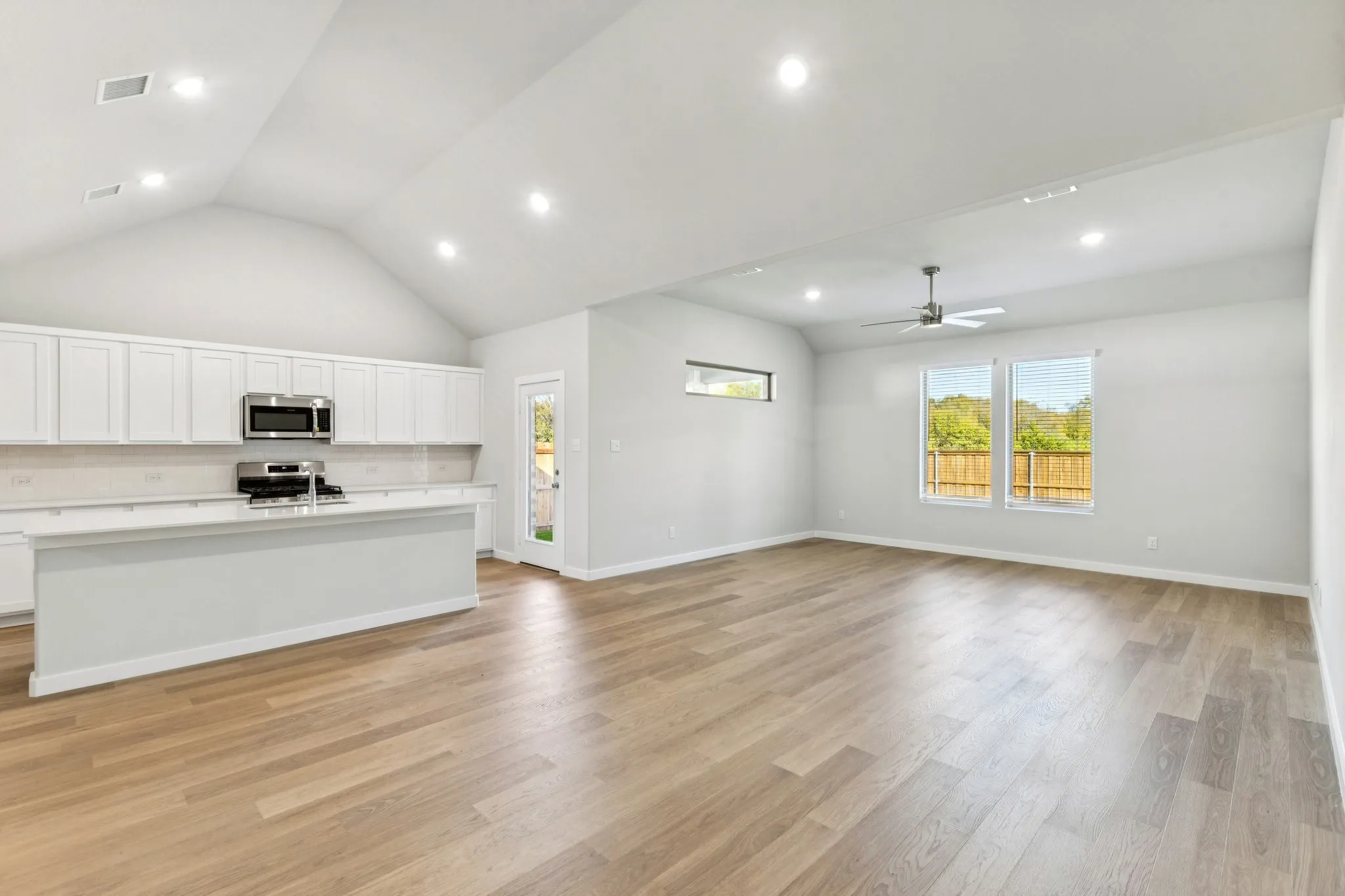 Kitchen in the Wimbledon home plan by Trophy Signature Homes – REPRESENTATIVE PHOTO