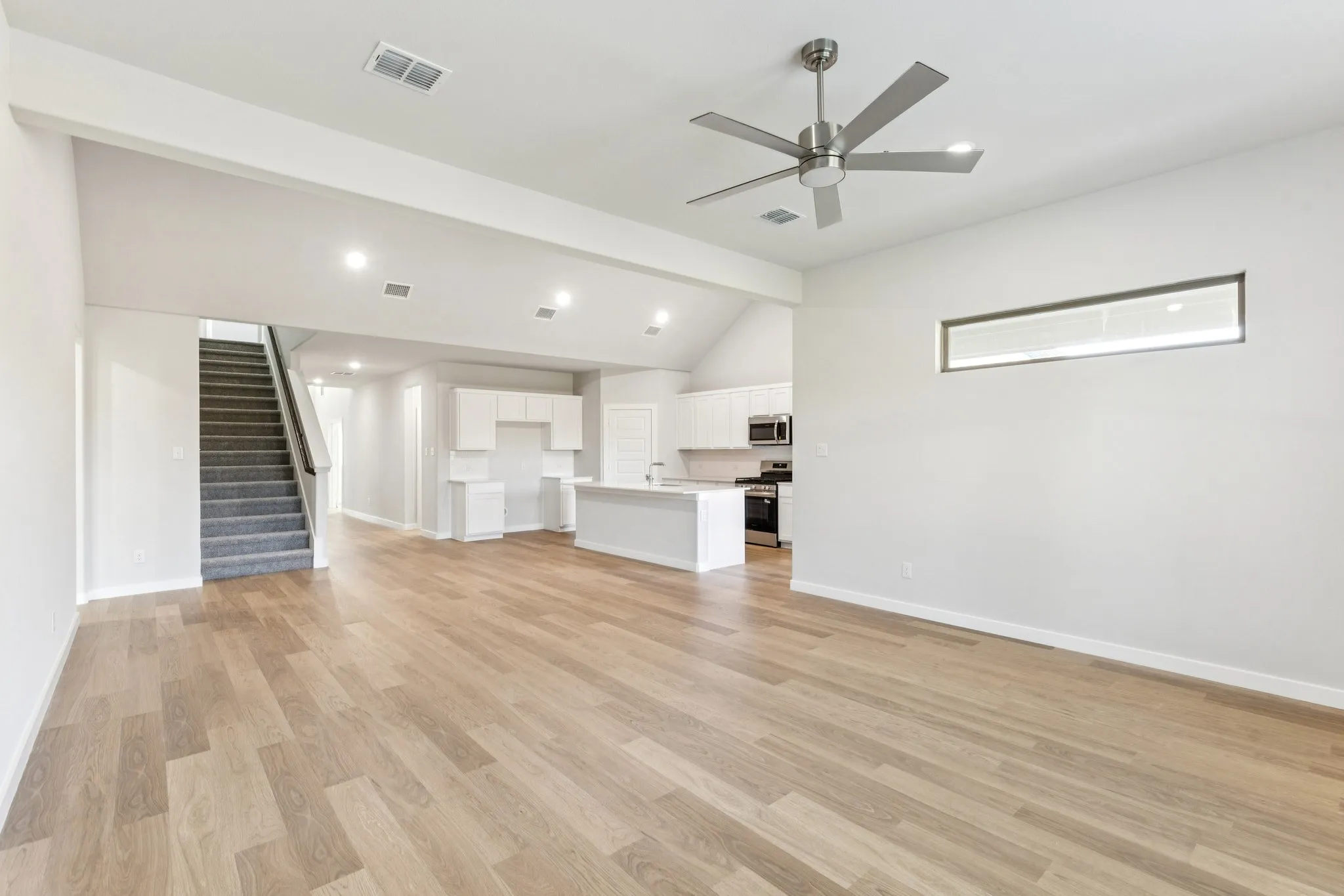 Open First Floor in the Wimbledon home plan by Trophy Signature Homes – REPRESENTATIVE PHOTO