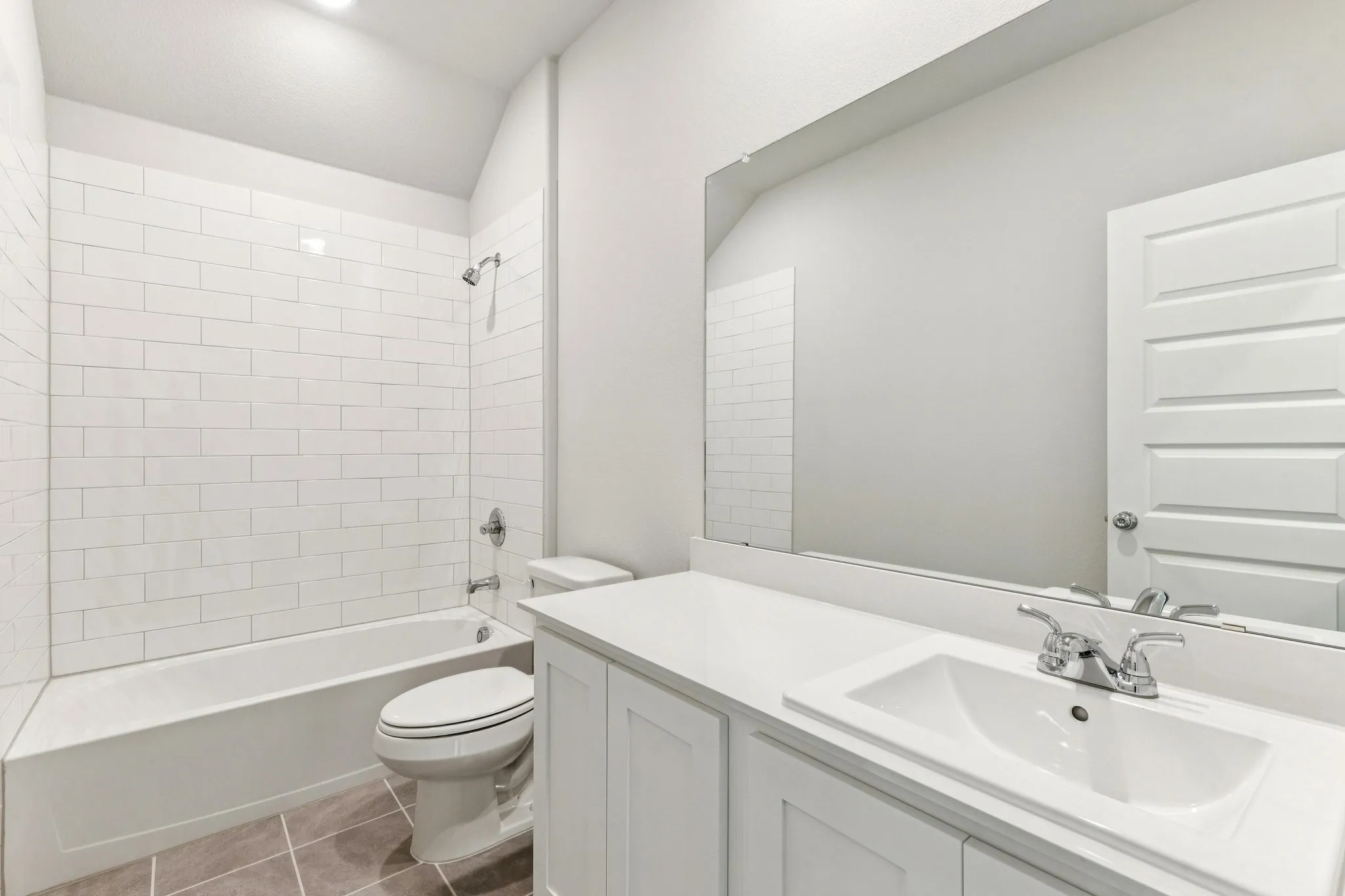 Bathroom in the Wimbledon home plan by Trophy Signature Homes – REPRESENTATIVE PHOTO