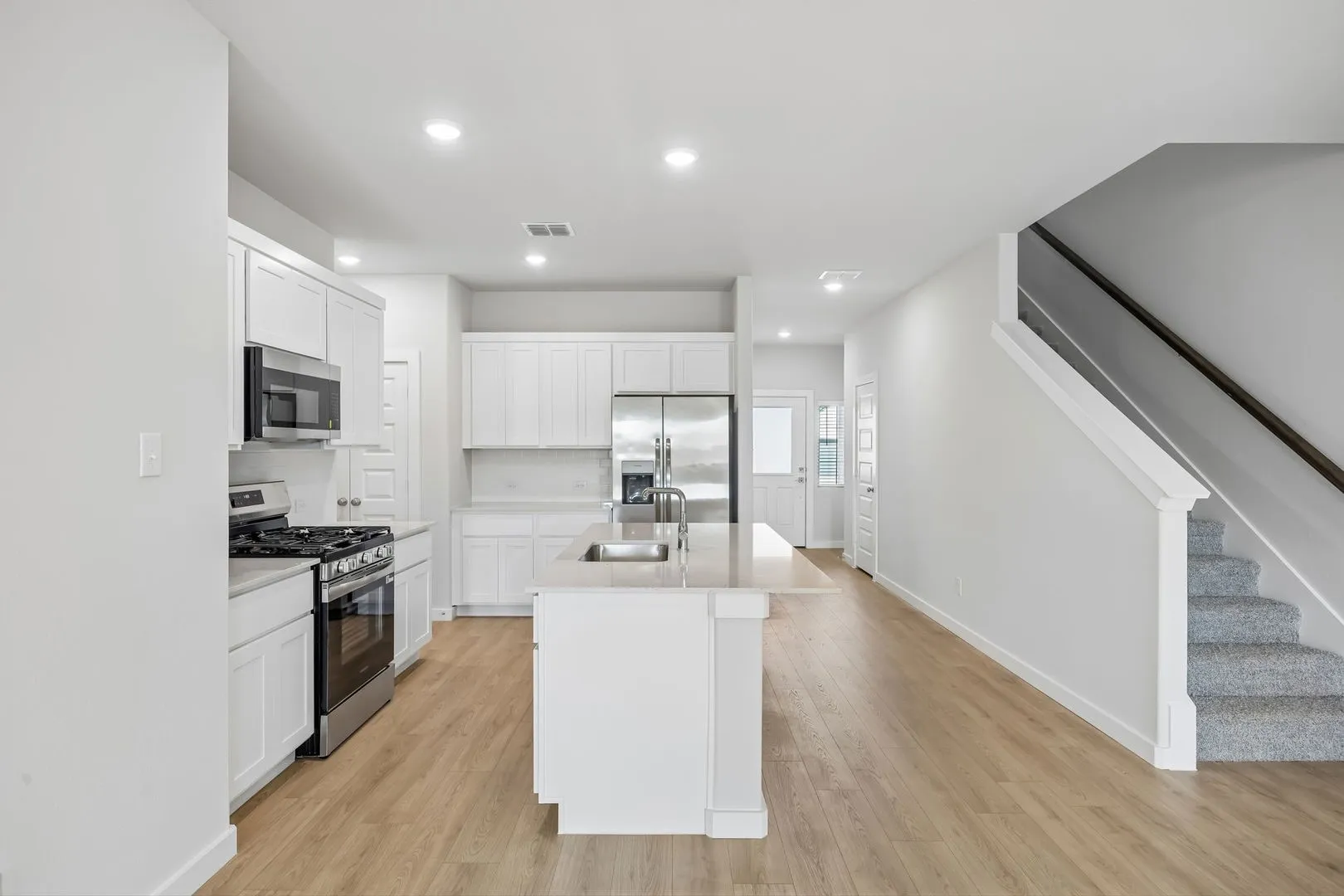 Kitchen in the Mesquite home plan by Trophy Signature Homes – REPRESENTATIVE PHOTO