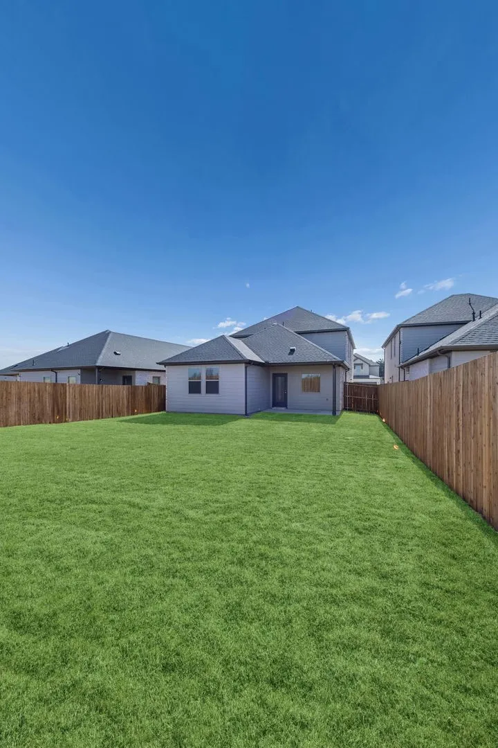 Covered Patio in the Oak II home plan by Trophy Signature Homes – REPRESENTATIVE PHOTO