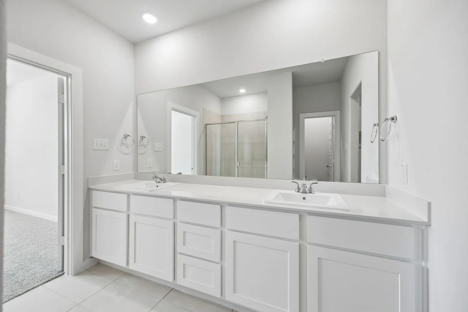 Primary Bathroom in the Mesquite home plan by Trophy Signature Homes – REPRESENTATIVE PHOTO