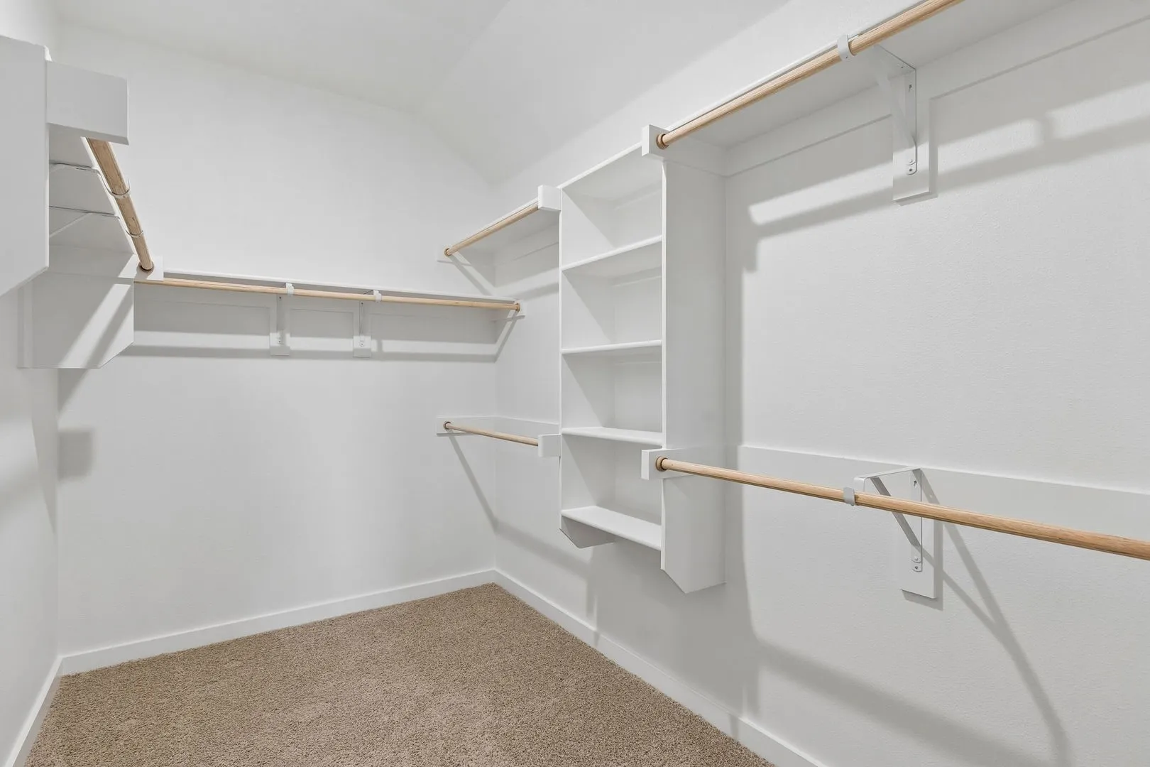 Primary Closet in the Oscar home plan by Trophy Signature Homes – REPRESENTATIVE PHOTO
