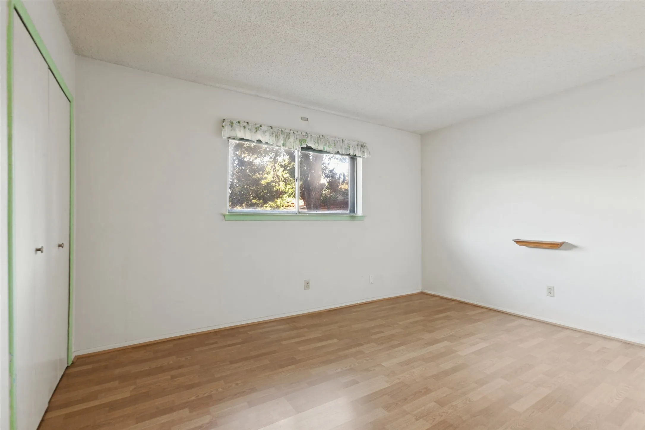 Wood-finish flooring throughout
