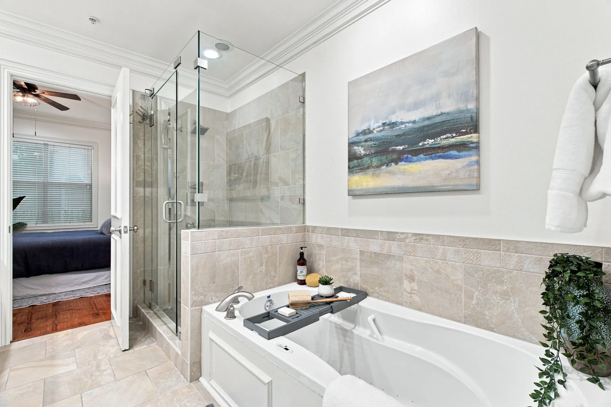 Primary bathroom with soaking tub and separate large shower.
