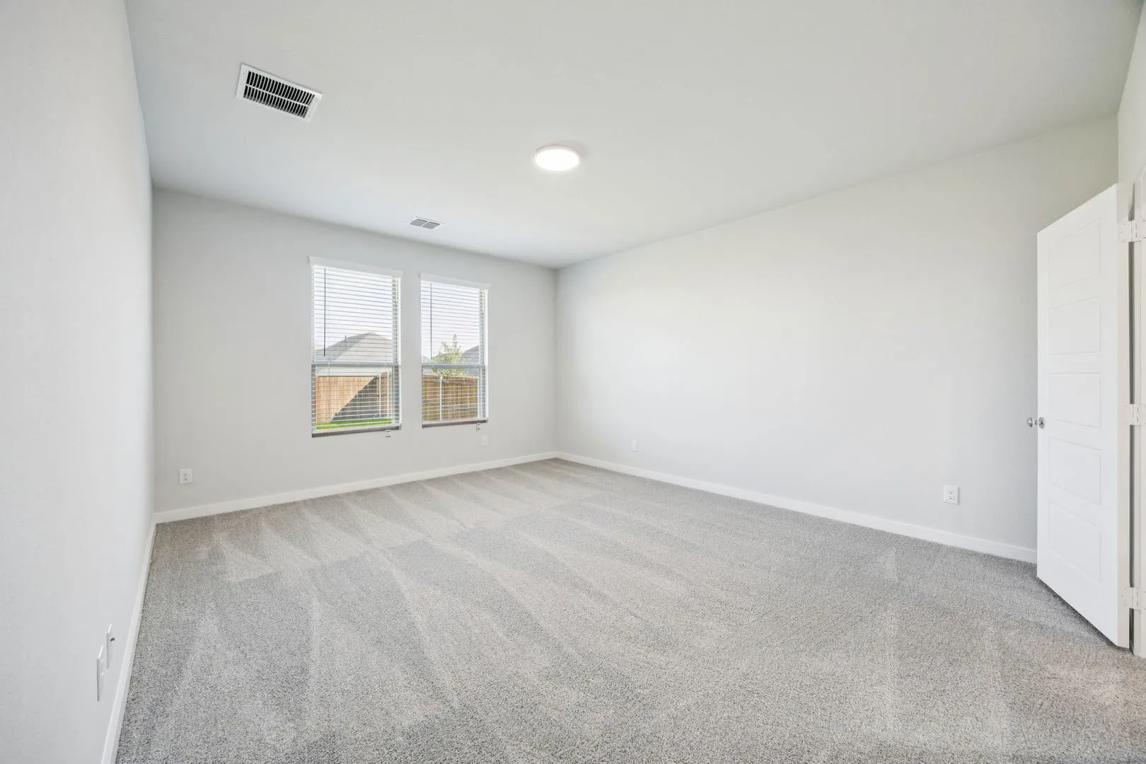 Primary Suite in the Masters home plan by Trophy Signature Homes – REPRESENTATIVE PHOTO