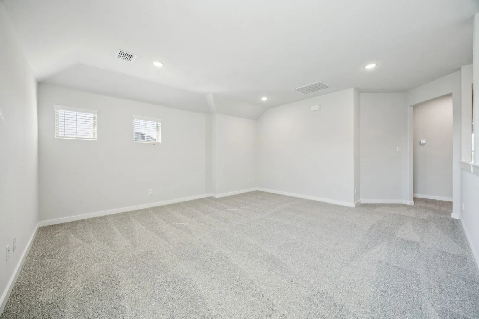 Game room in the Masters home plan by Trophy Signature Homes – REPRESENTATIVE PHOTO