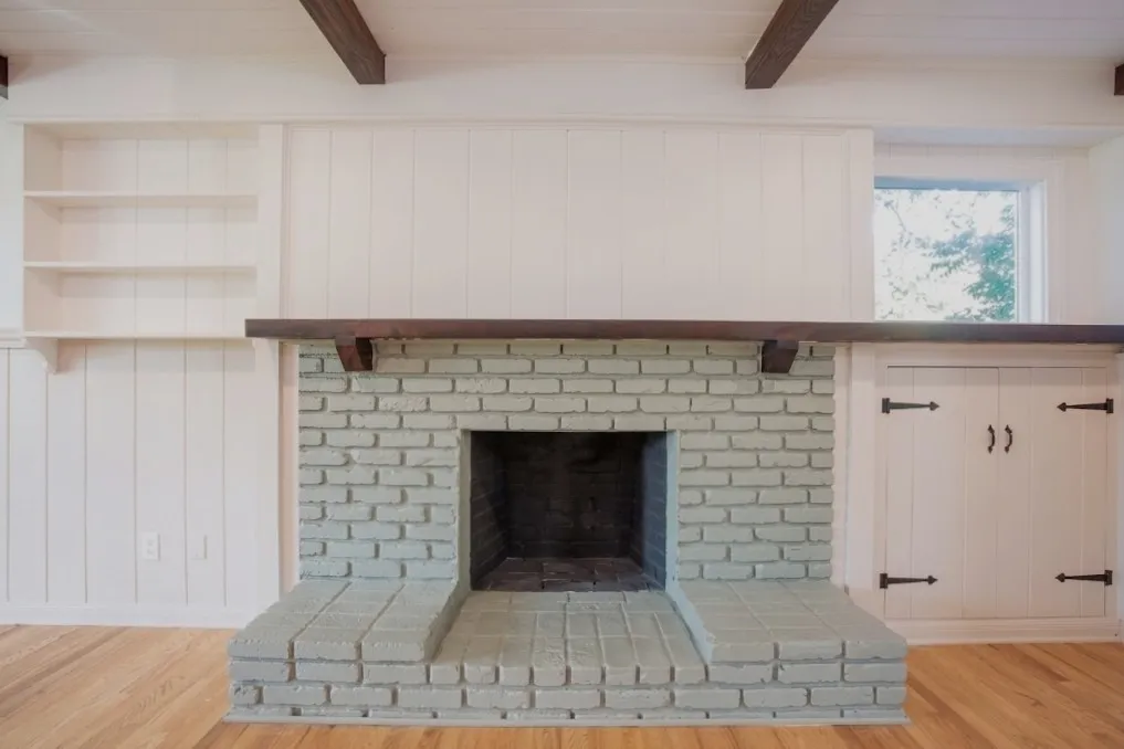 Wood burning brick fireplace in the living room