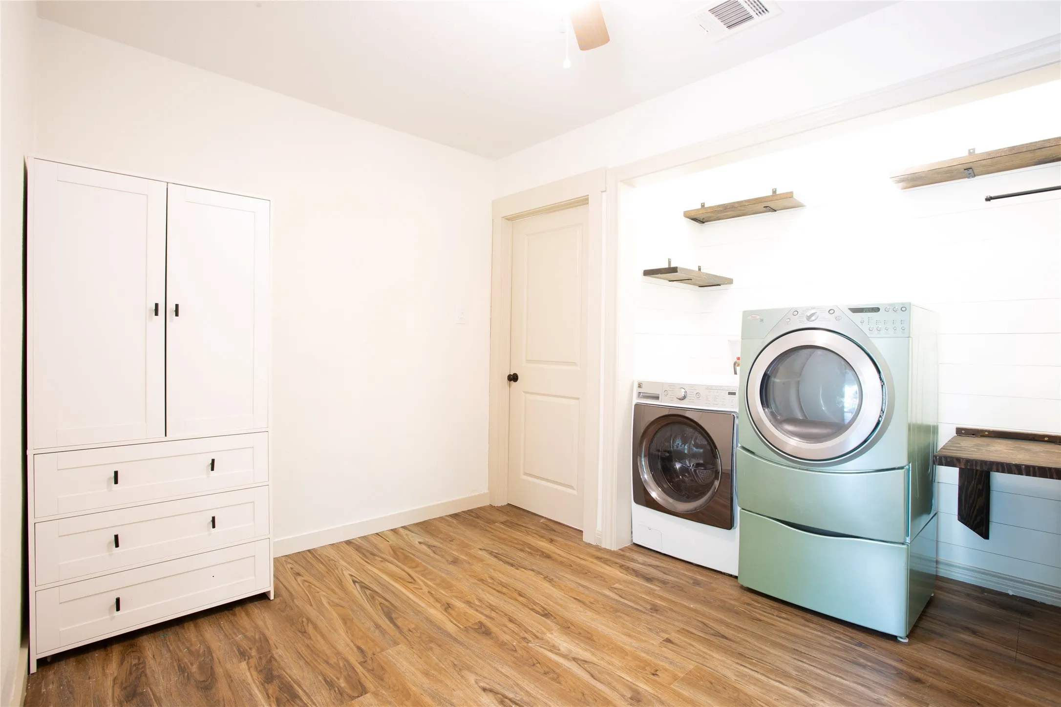 Laundry and  flex room with murphy bed when a 5th bedroom is needed
