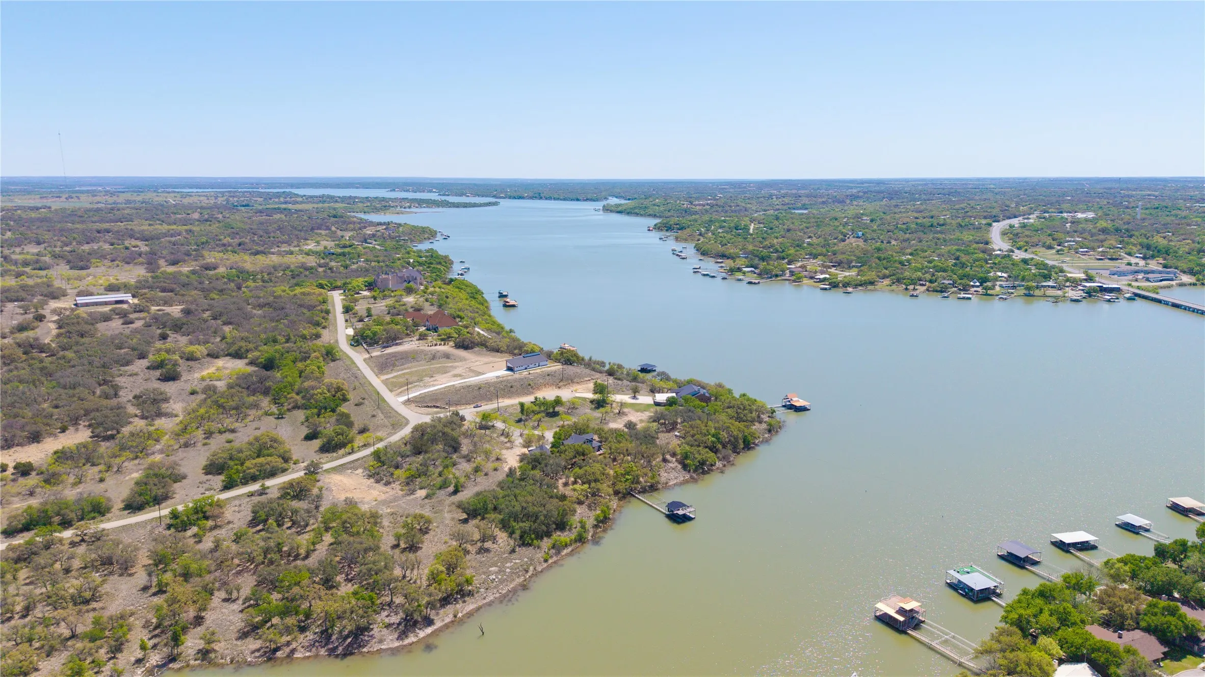 Expansive waterfront property with several established residences and multiple undeveloped parcels