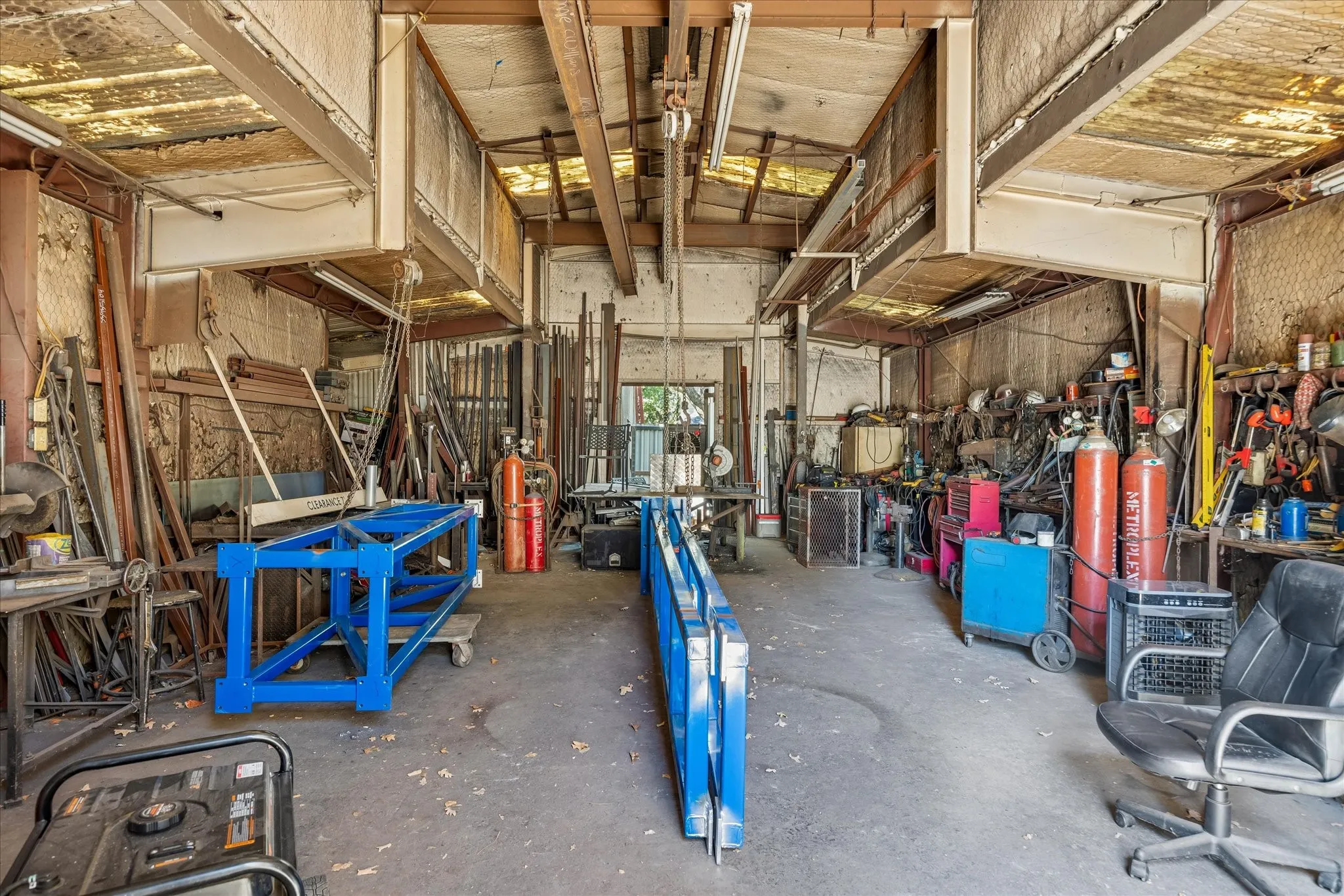 Seller will remove all tools, equipment, materials, and debris from out buildings before closing.