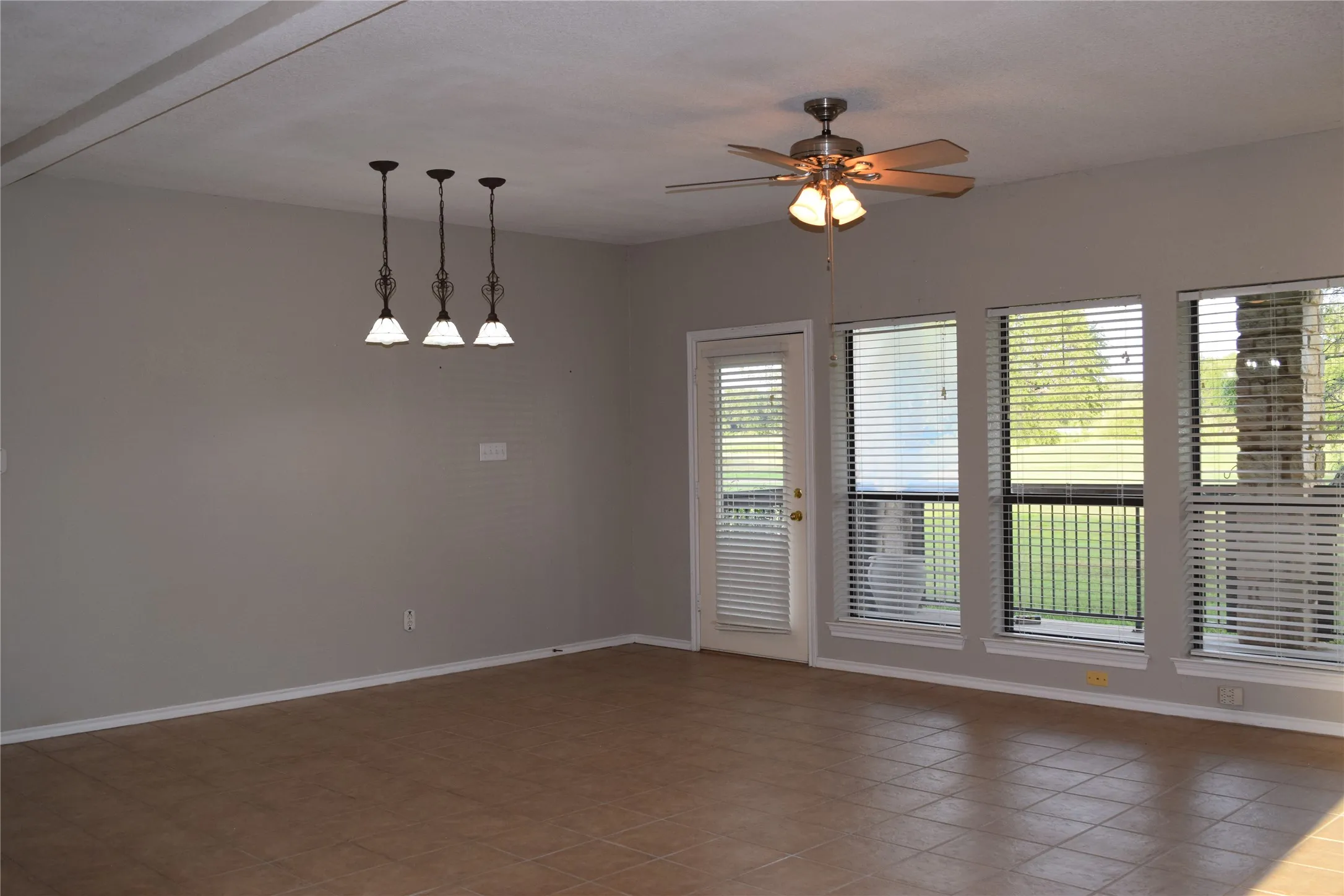 Immediate view of tiled living /dining area.