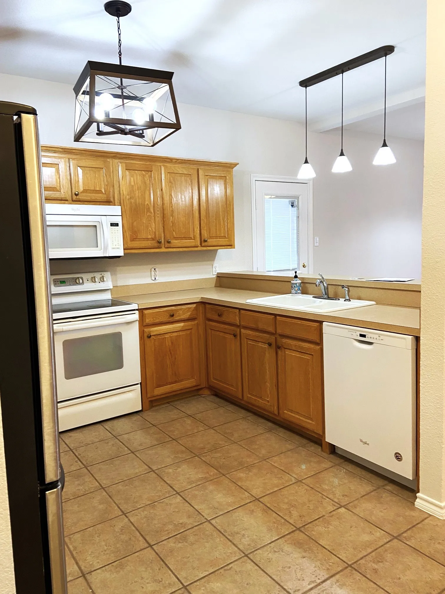 Designer lighting and front of dish washer.
