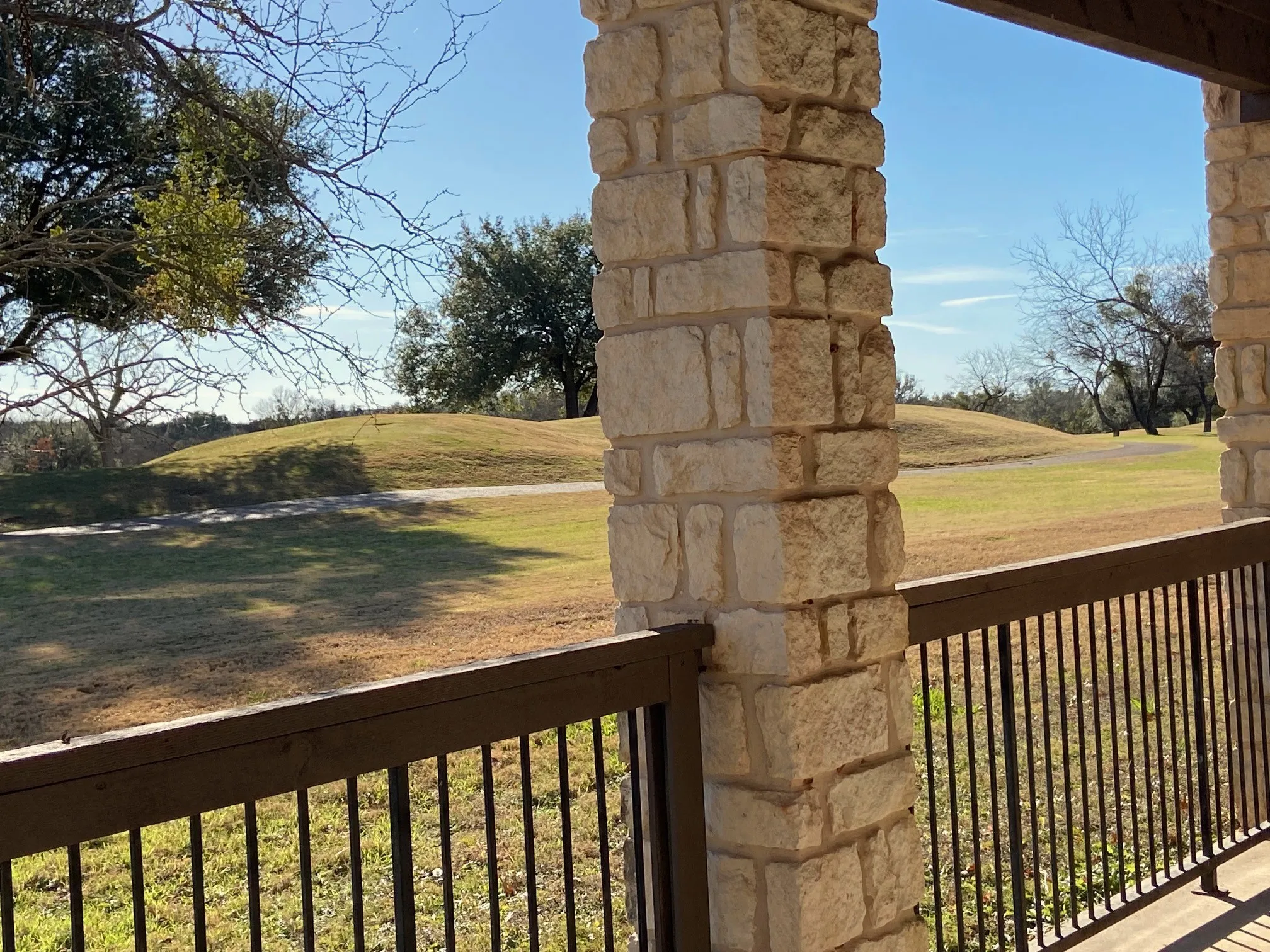 Large back patio viewing the golf course.