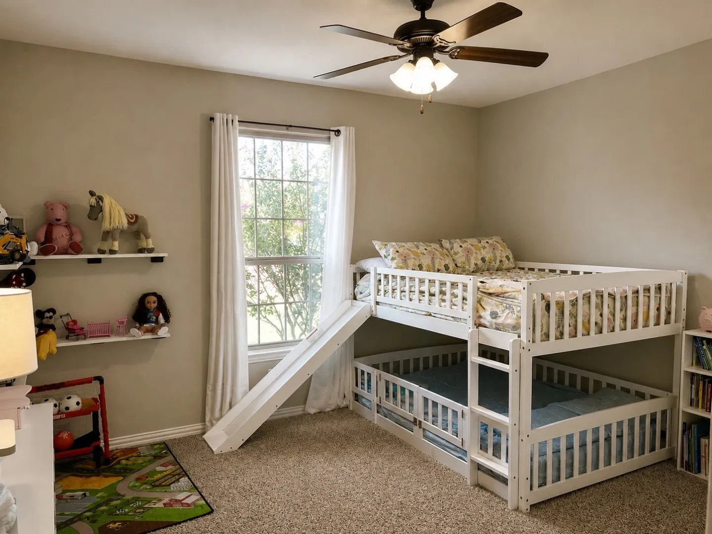 Neutral-toned walls complement plush carpet flooring
