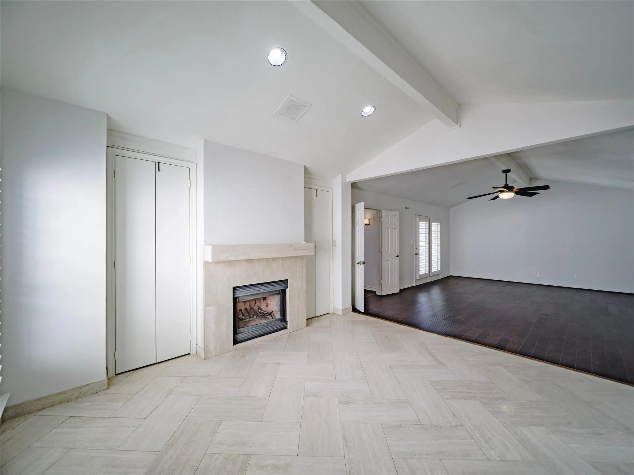Upstairs primary suite with fireplace