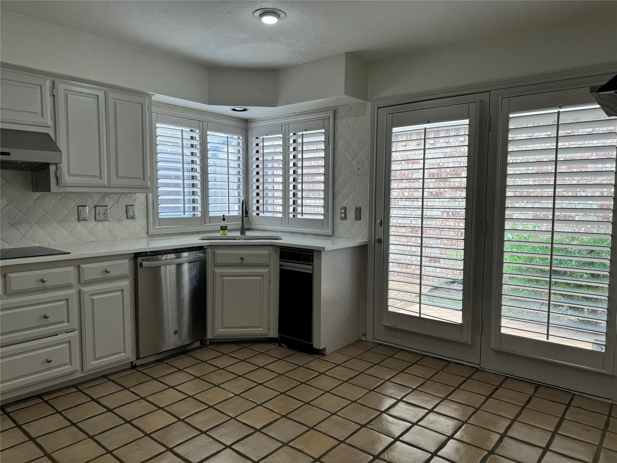 Kitchen has access to backyard