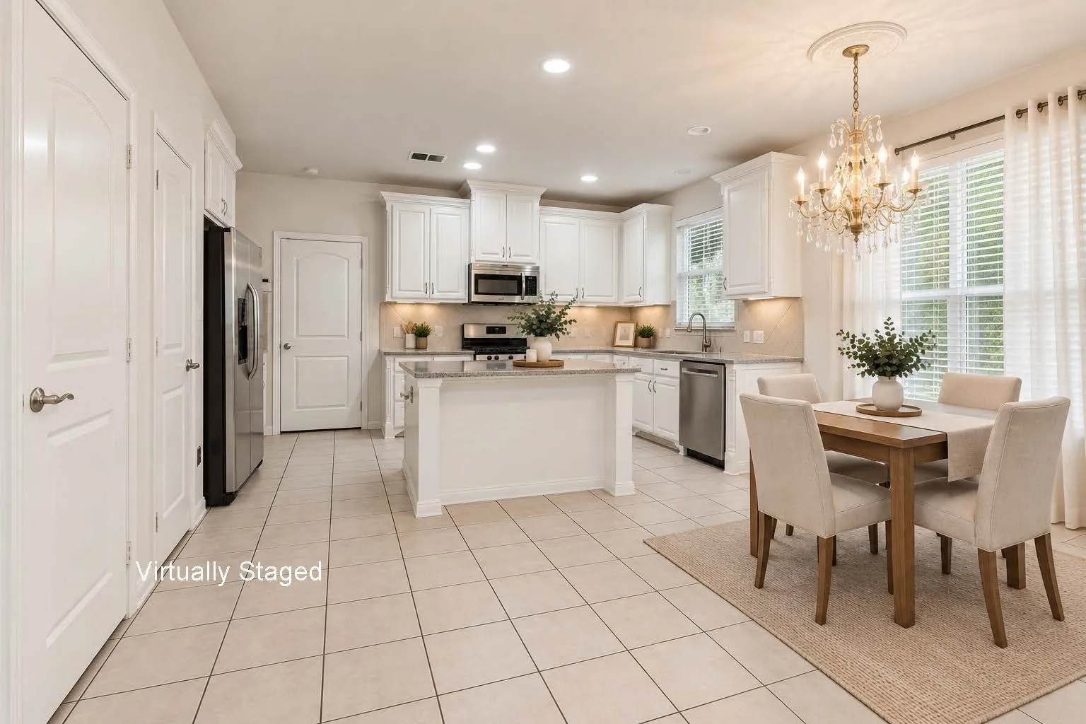 Virtually Staged- Here's a view of the dining room and kitchen.