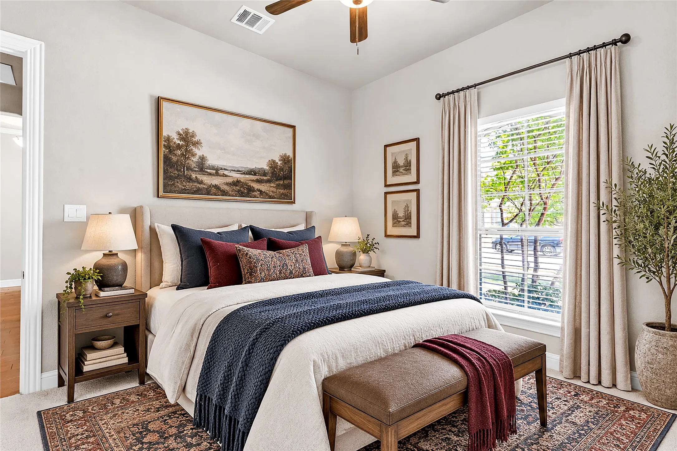 Tray ceiling, ceiling fan, dual windows with blinds, wood-finish flooring, and a neutral wall color. Virtual staged.