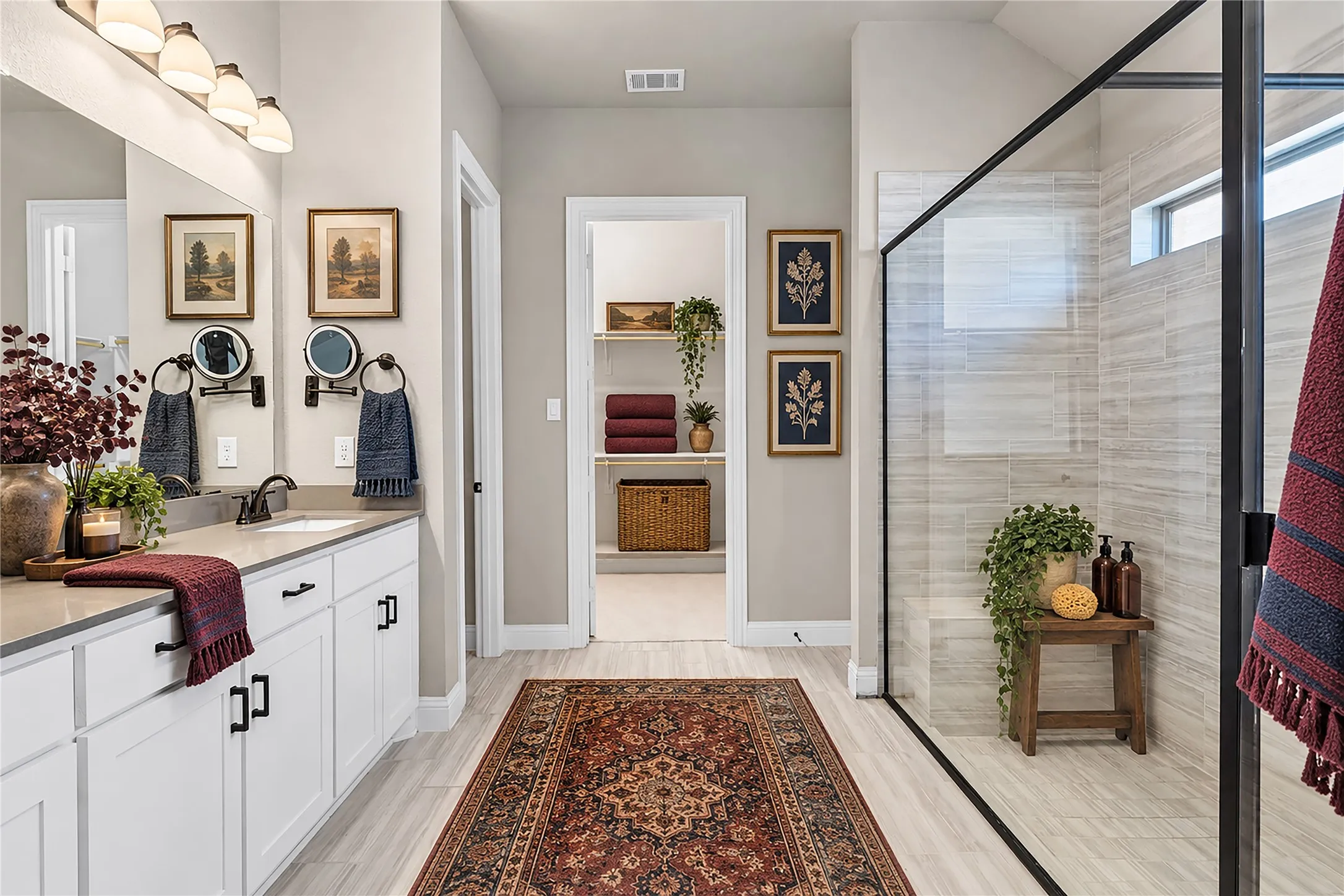 Double vanity with a light-toned countertop and white cabinetry. Virtual staged.