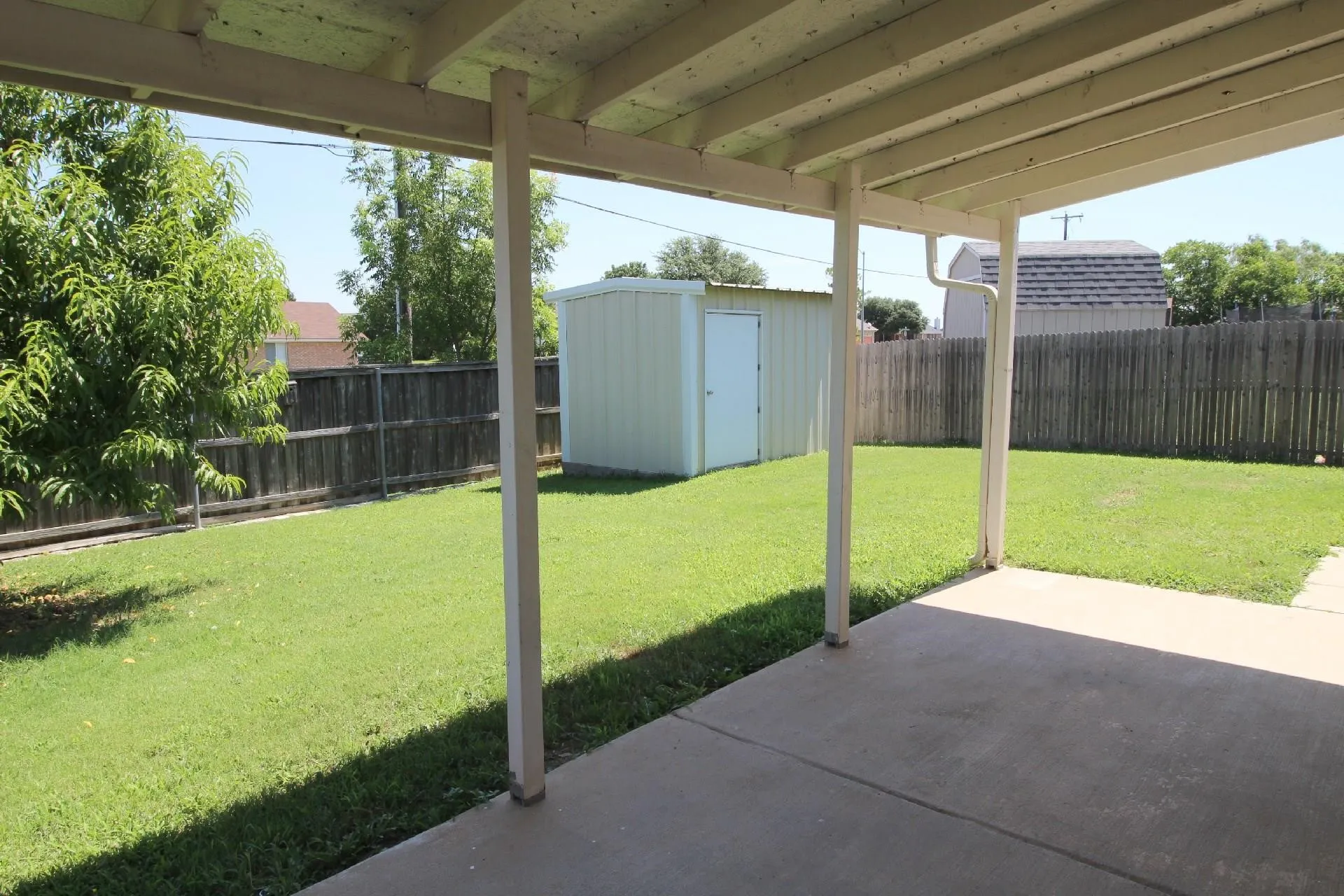 Back Yard with Covered Patio and Storage