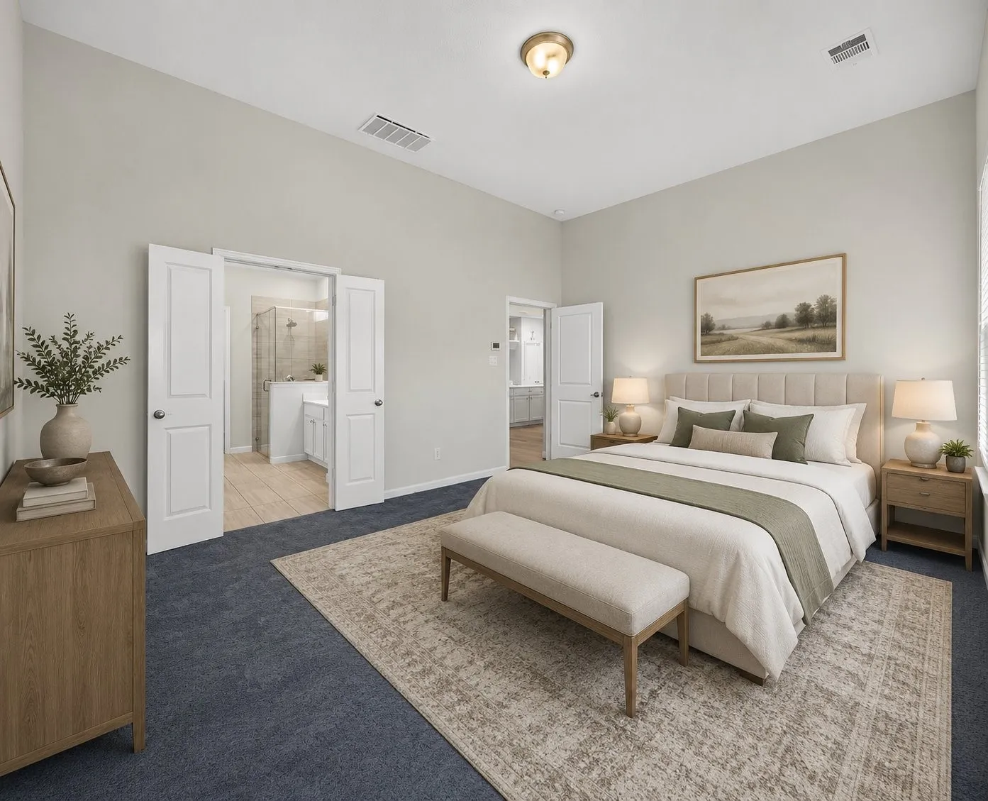 Vaulted ceiling, recessed lighting, double doors, neutral wall tones, and carpet flooring