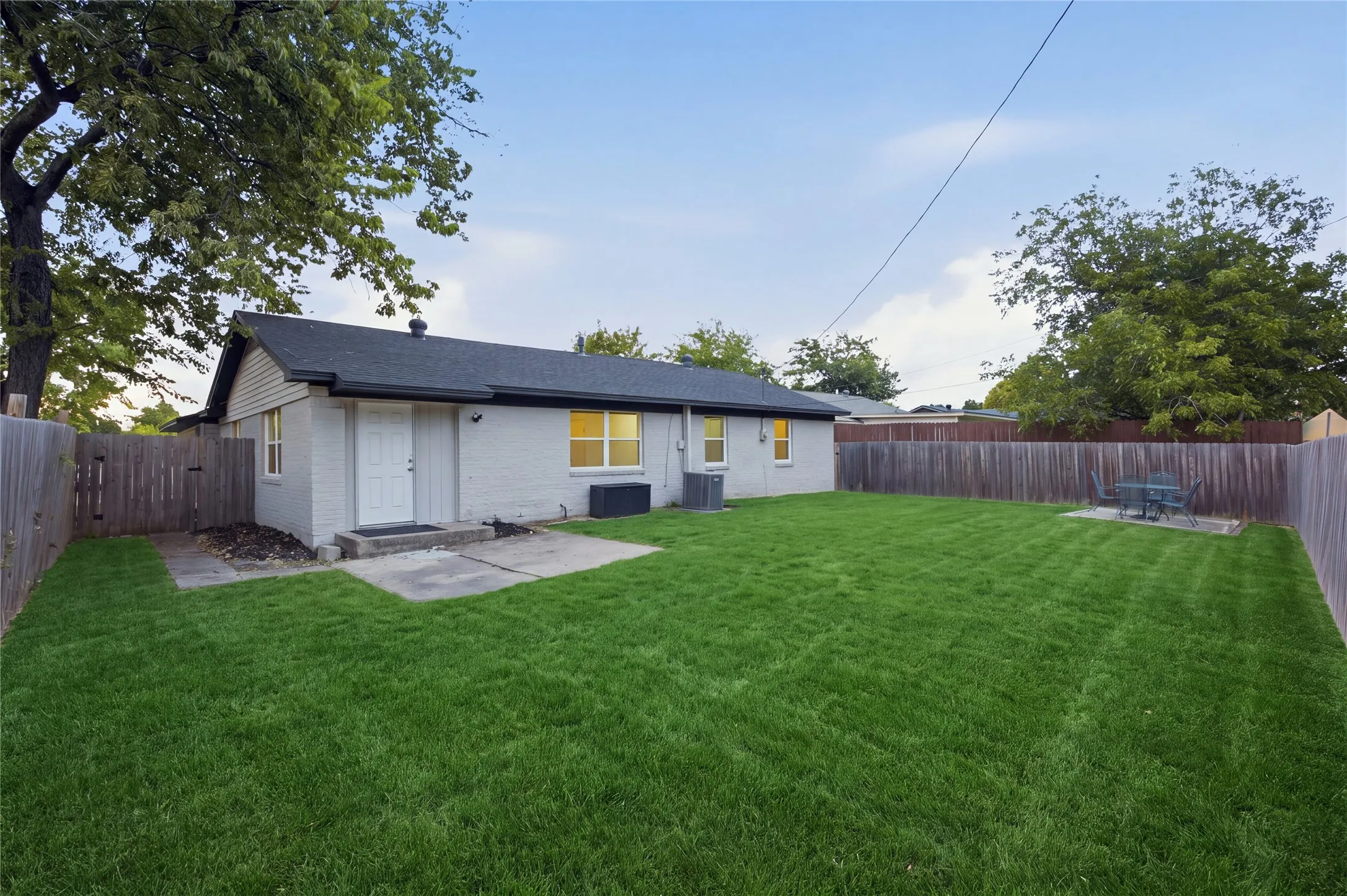 Spacious backyard! Photo is digitally enhanced.