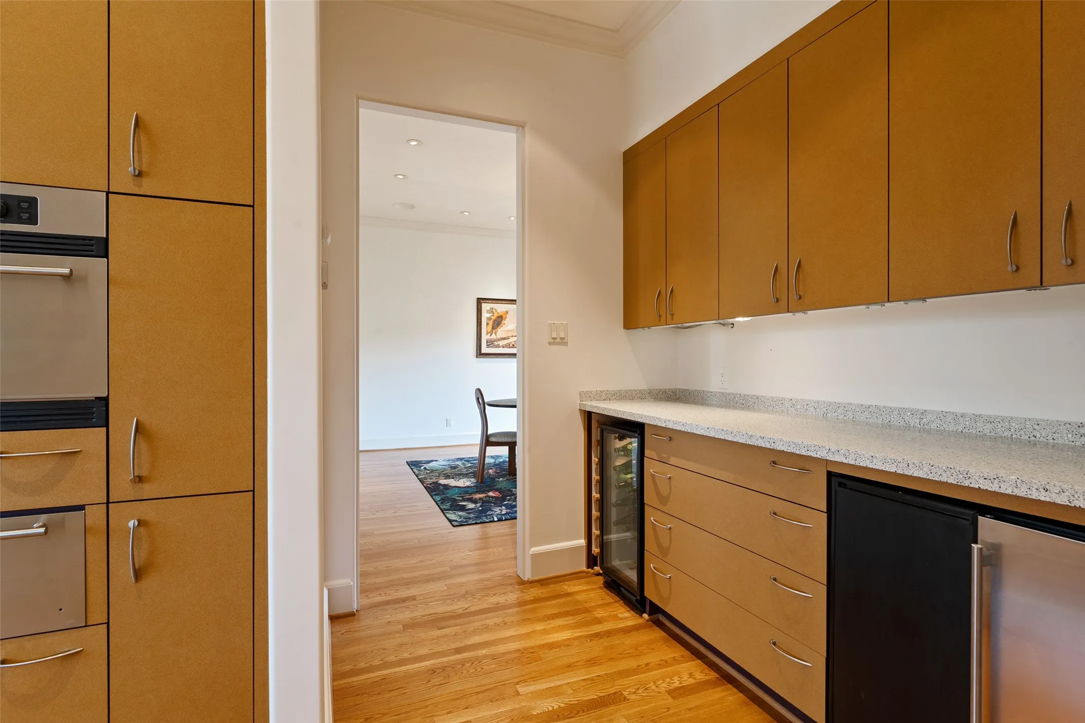Butler's pantry with wine cooler and ice maker