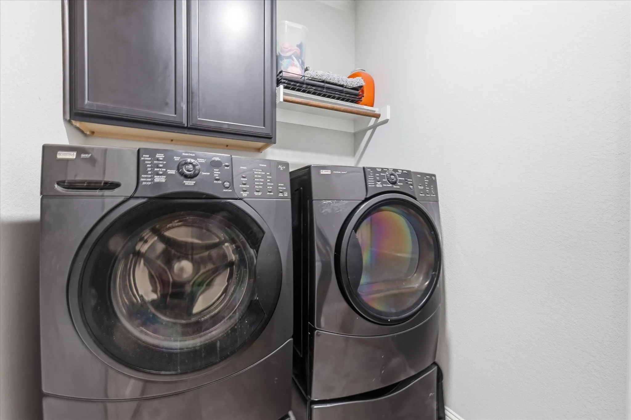 
Full size laundry room with storage