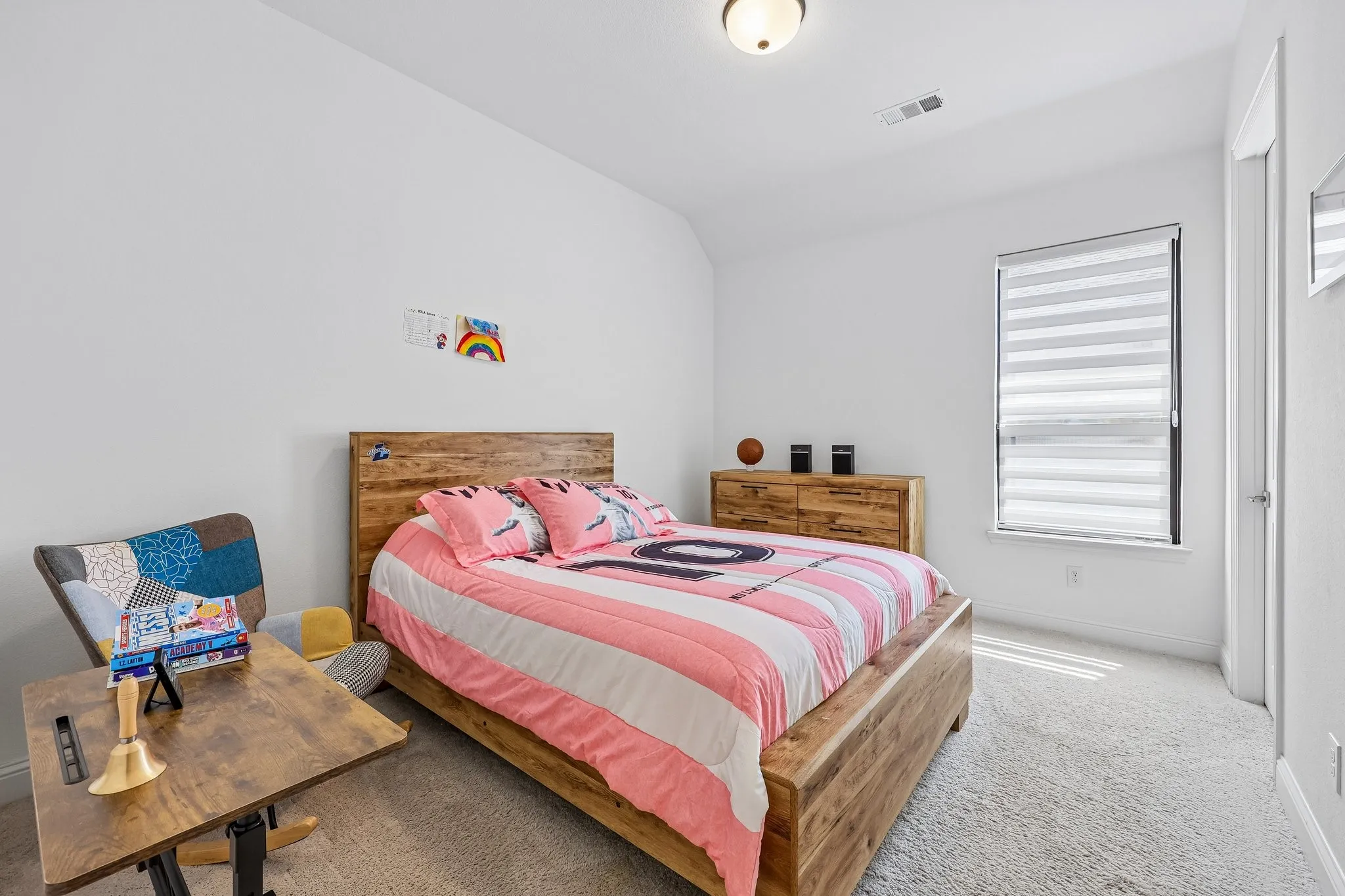 Recessed lighting, window with blinds, light-colored carpeting, white walls, and a ceiling-mounted light fixture
