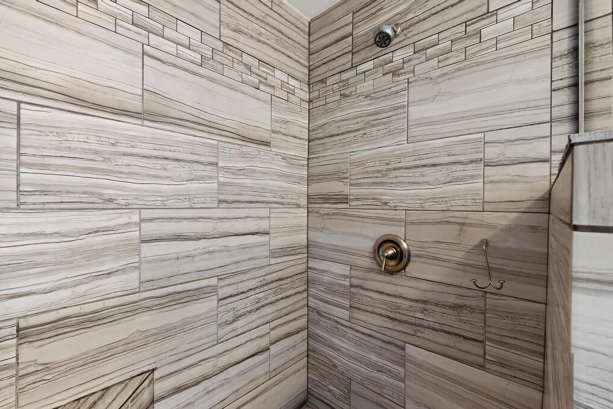 Bathroom with a tile shower