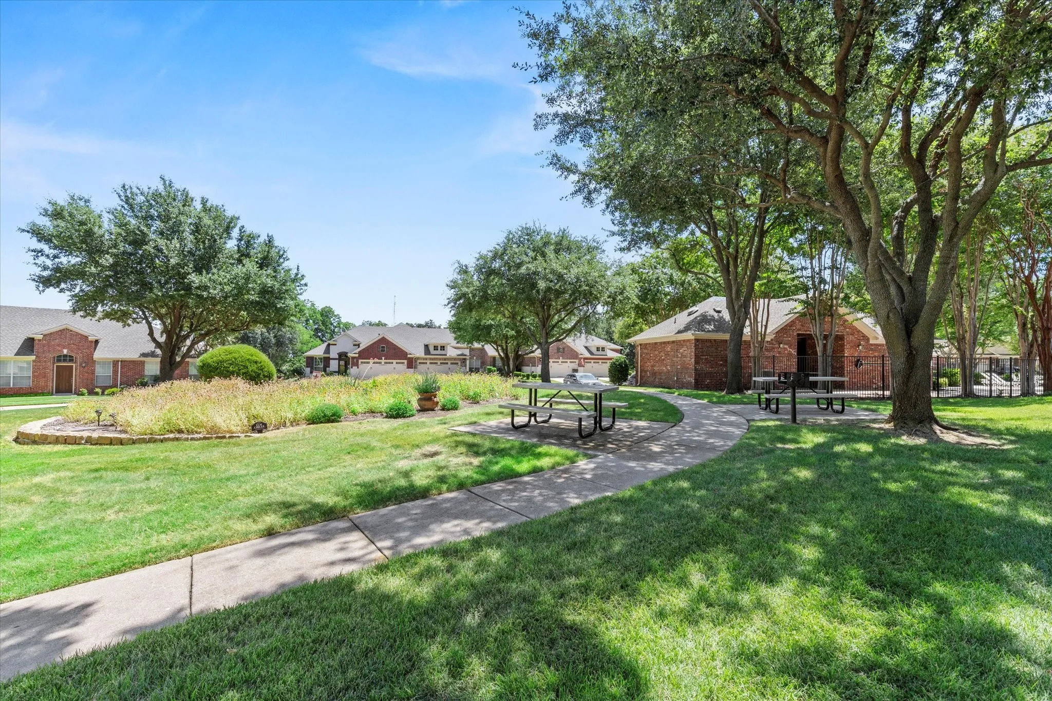 Community amenities and picnic area near pool.