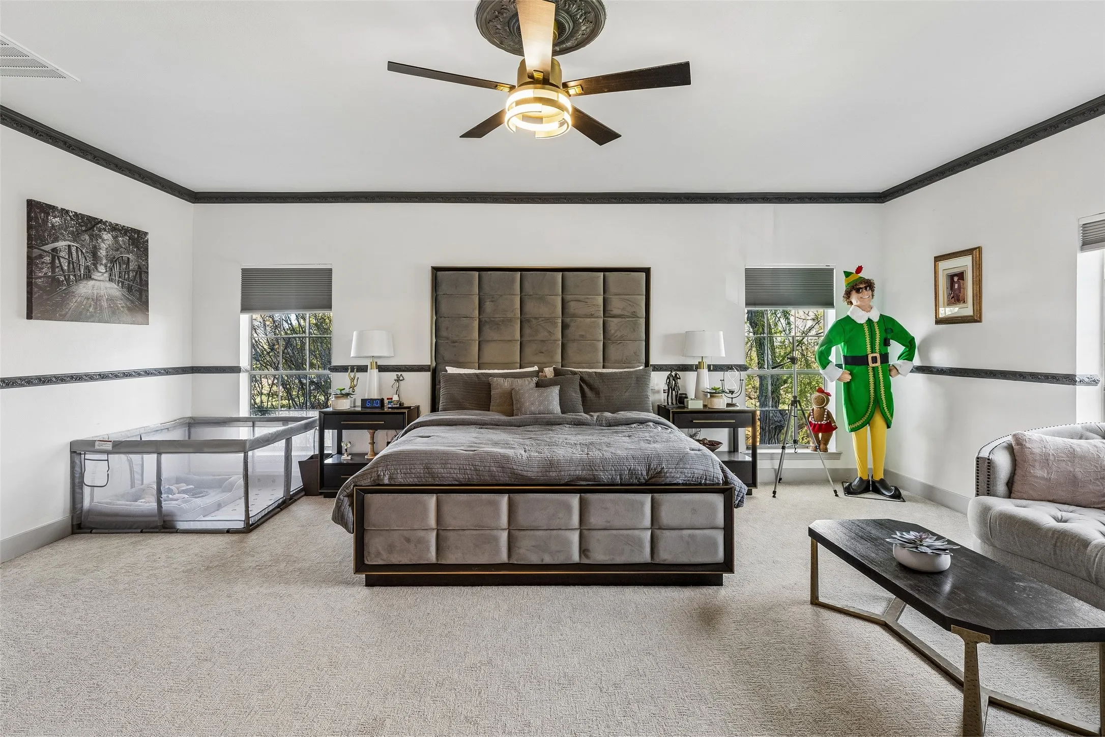 Recessed lighting, ceiling fan with ornate medallion, crown molding, double windows, and carpet flooring
