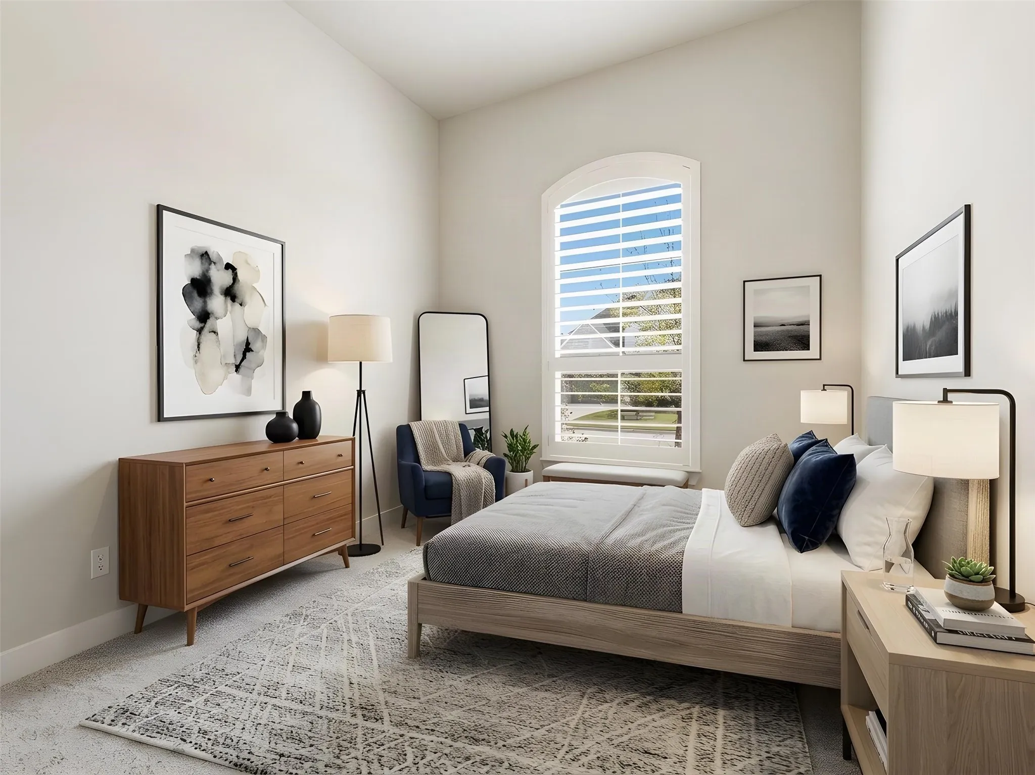 Arched window with plantation shutters, vaulted ceiling, and neutral wall paint