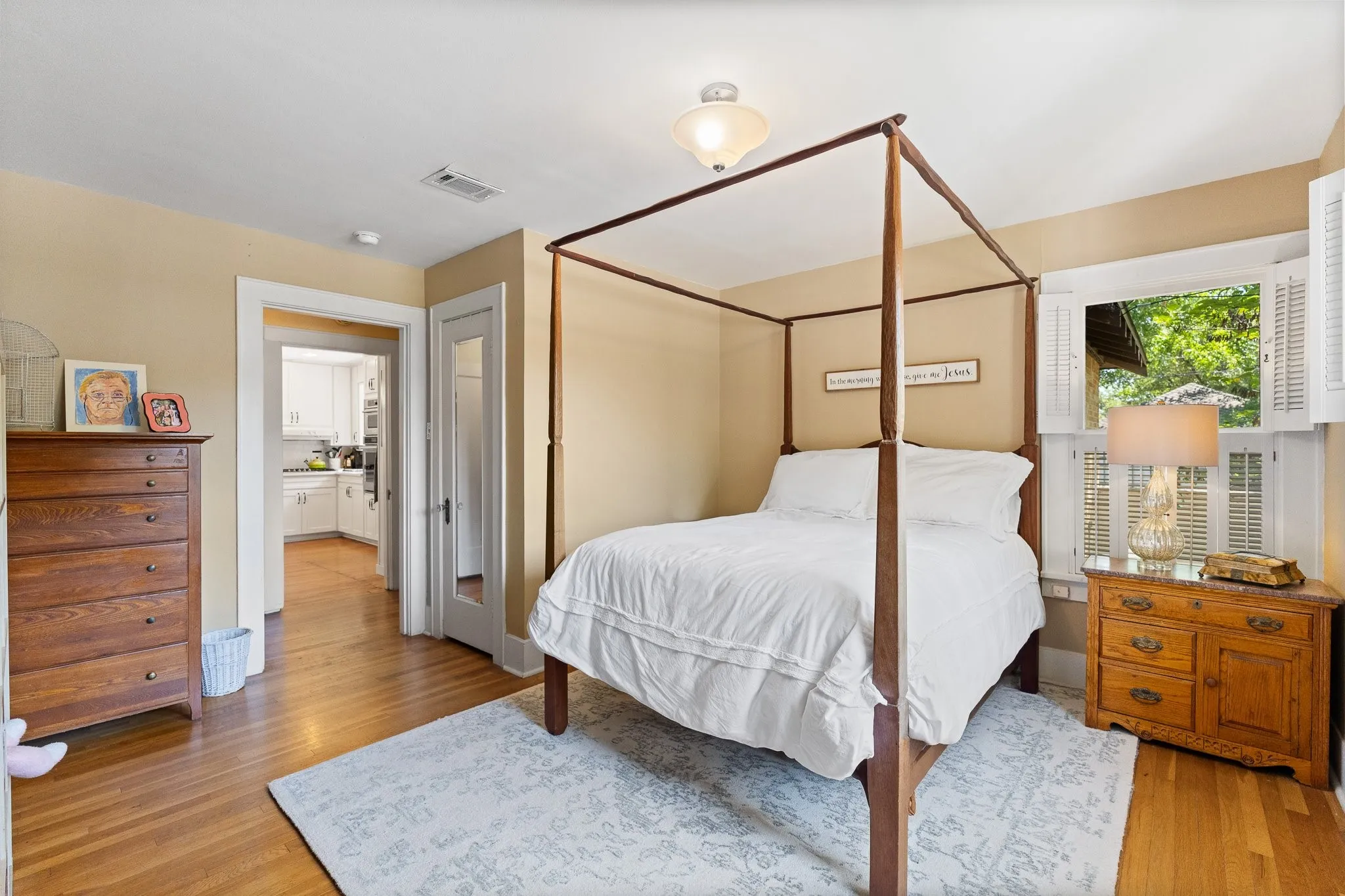 Here's a picture of a guest bedroom. Lots of light and cute shutters.
